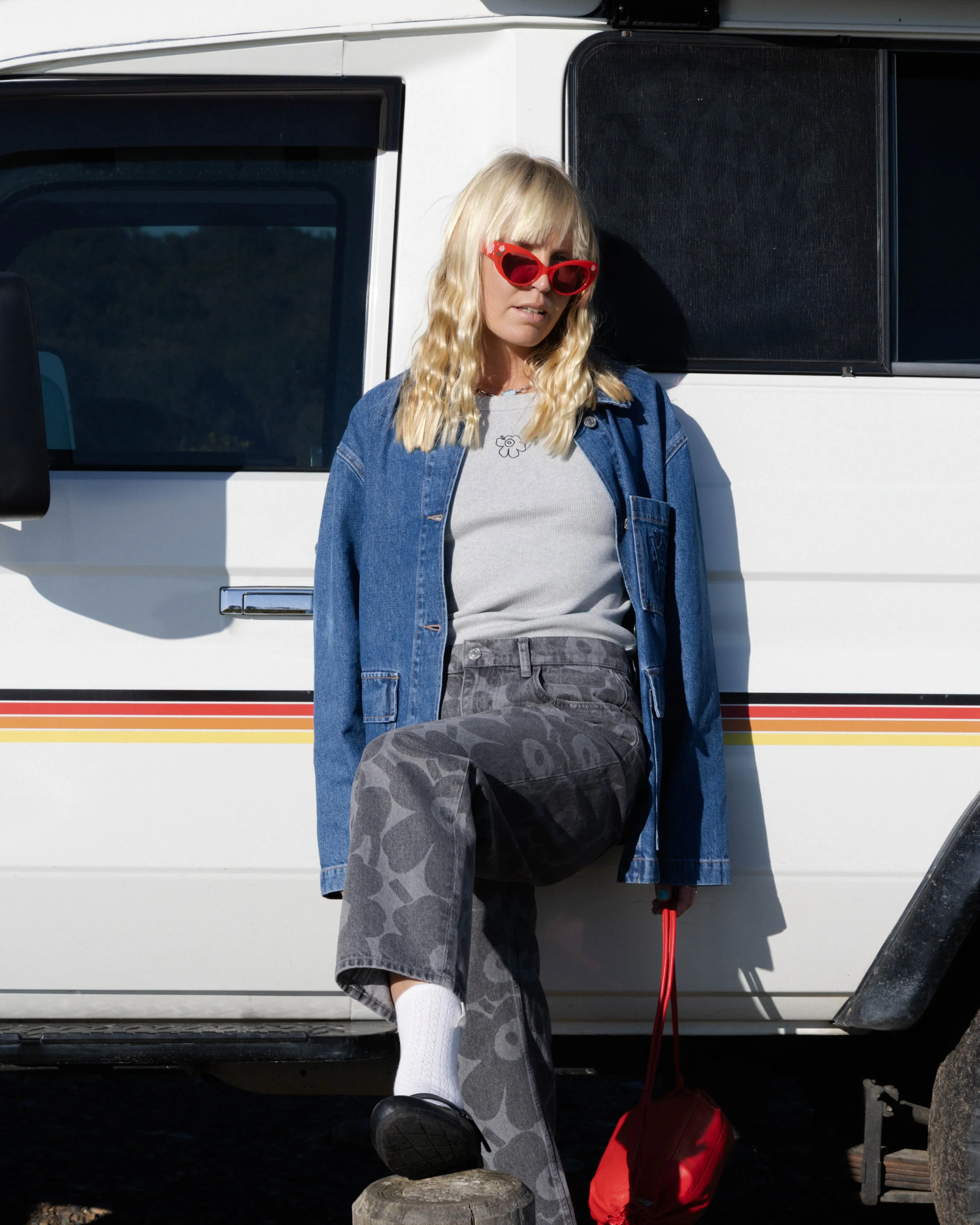 Sonja Vahasaari in Marimekko campaign modeled by a land cruiser.