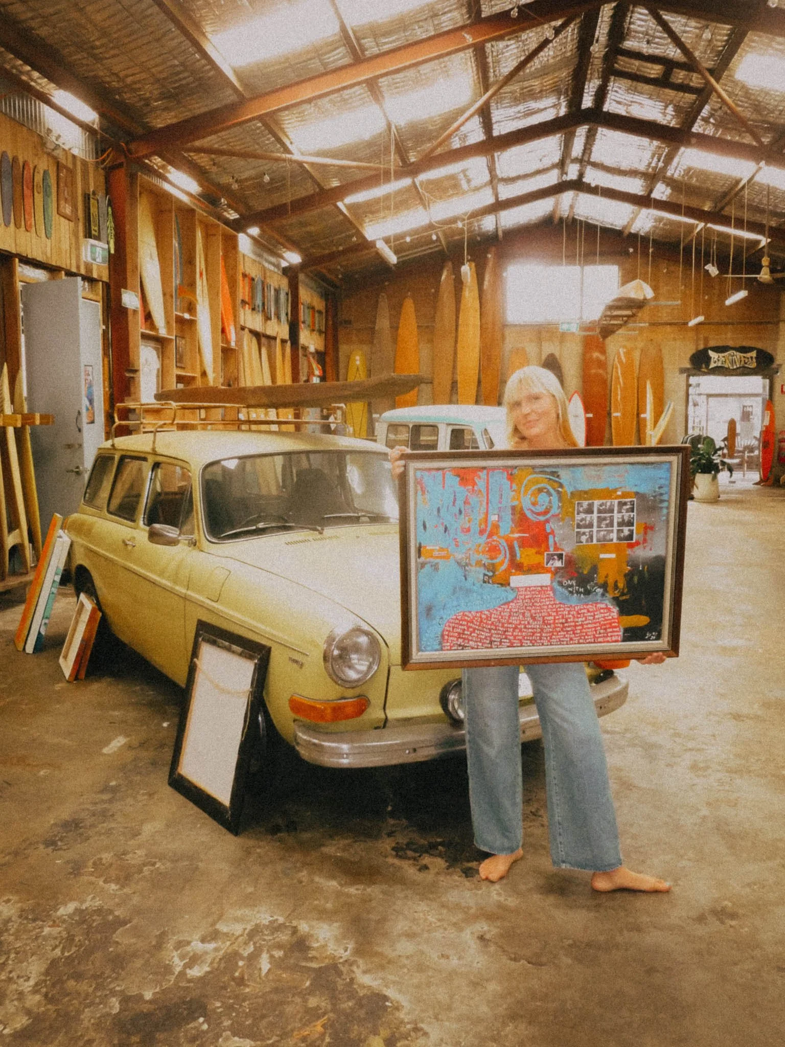 Sonja Katariina Vahasaari and her painting in Interconnectedness art exhibition.