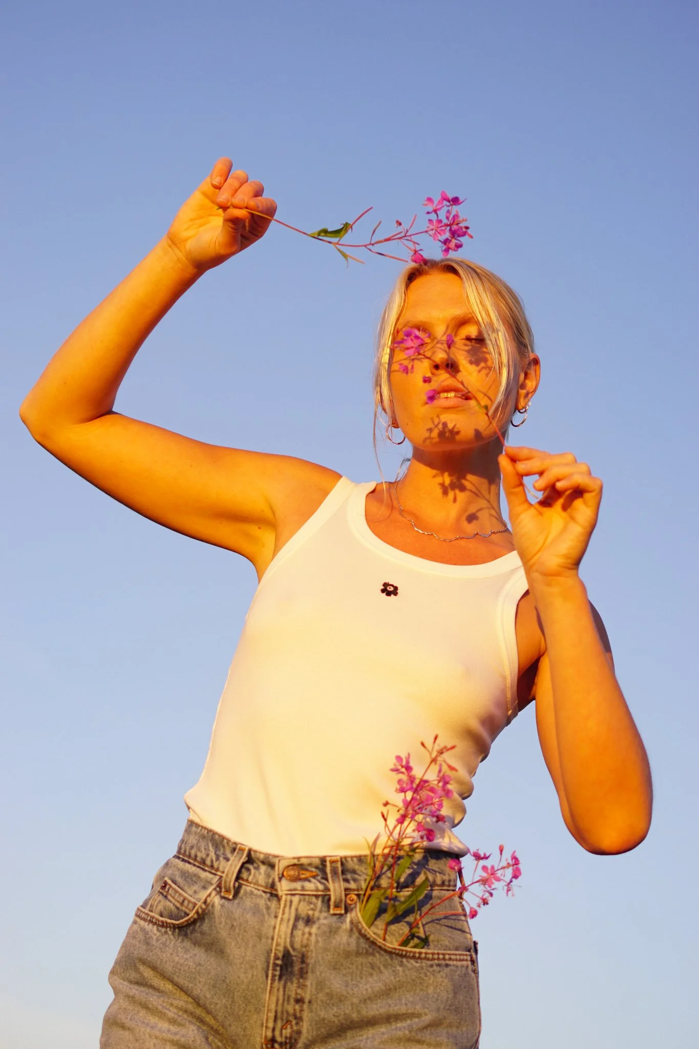 Sonja Vahasaari in Marimekko summer shoot in Finland, shot in golden lighting.