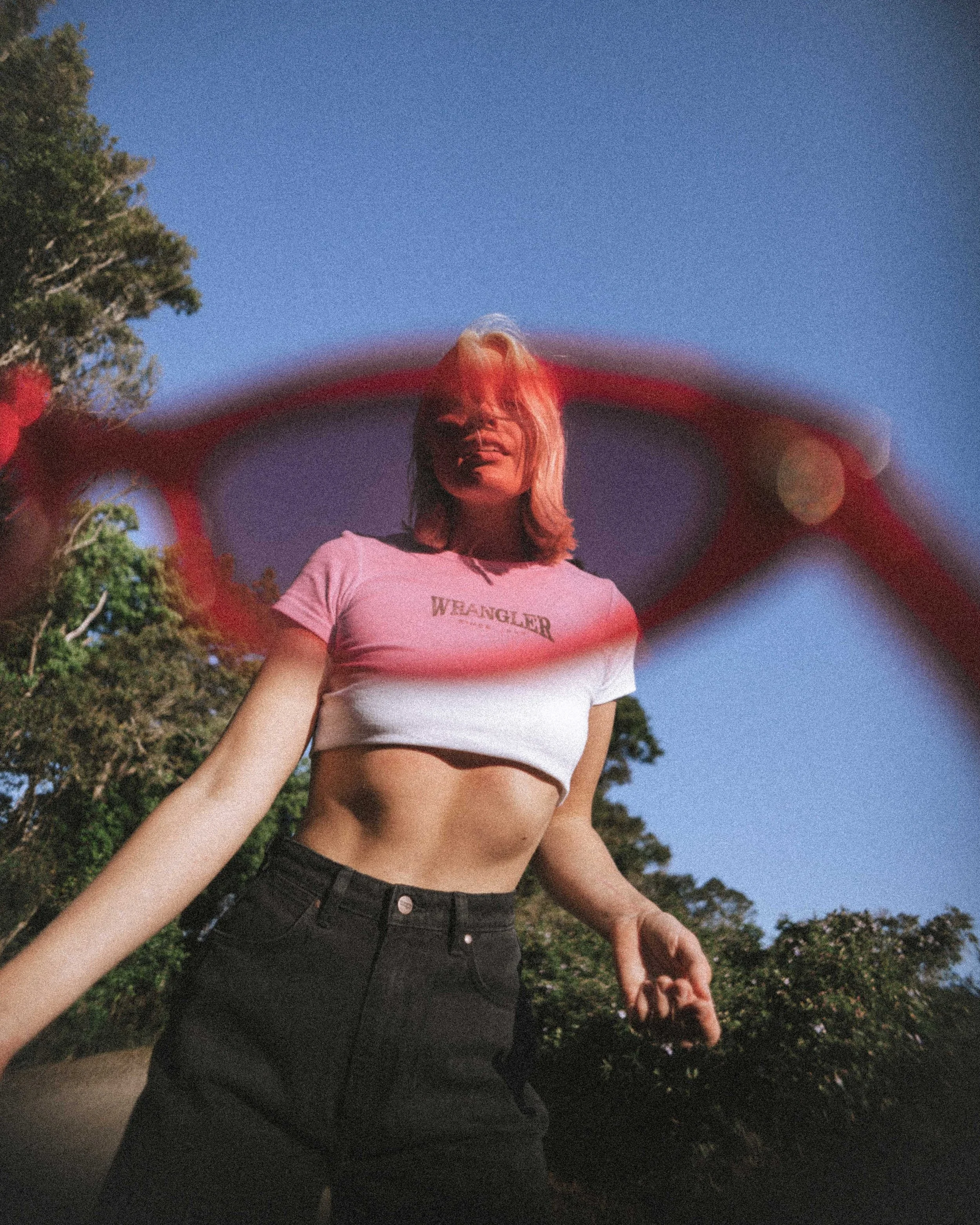 Editorial shot of Sonja Vahasaari, taken through a pair of sun glasses for Wrangler fashion campaign.