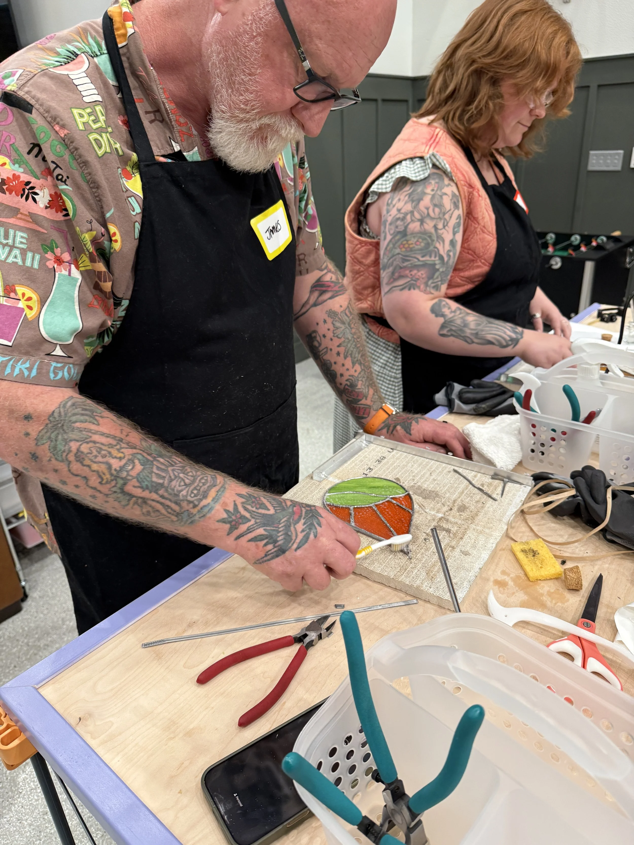 Beginner stained glass workshop making a teardrop design