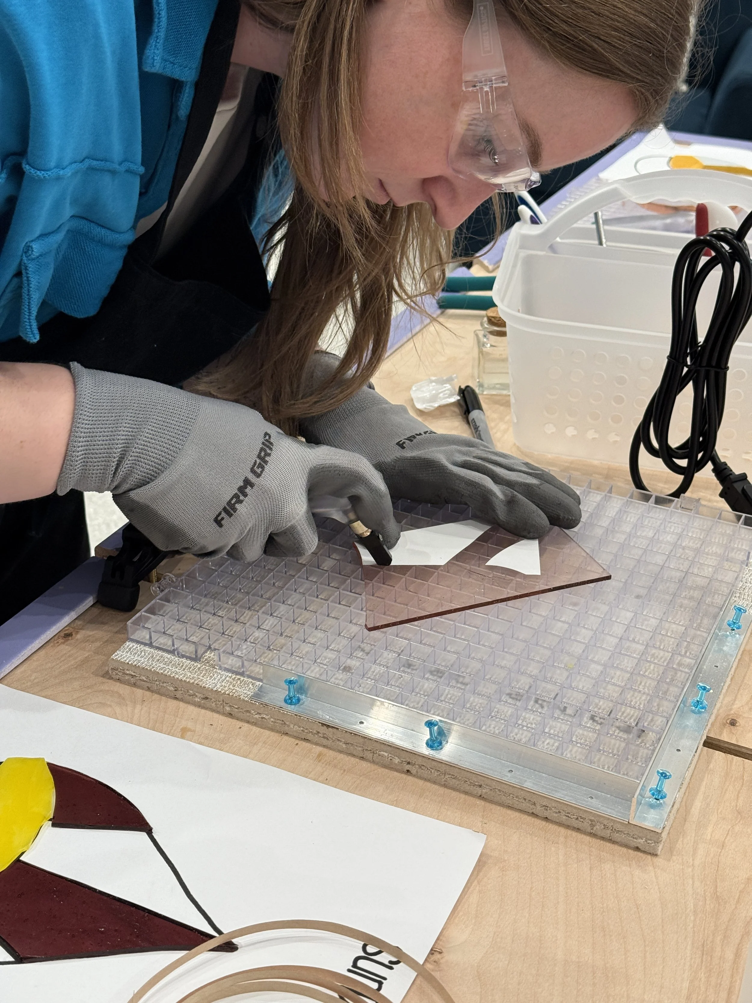 Beginner stained glass workshop making a teardrop design