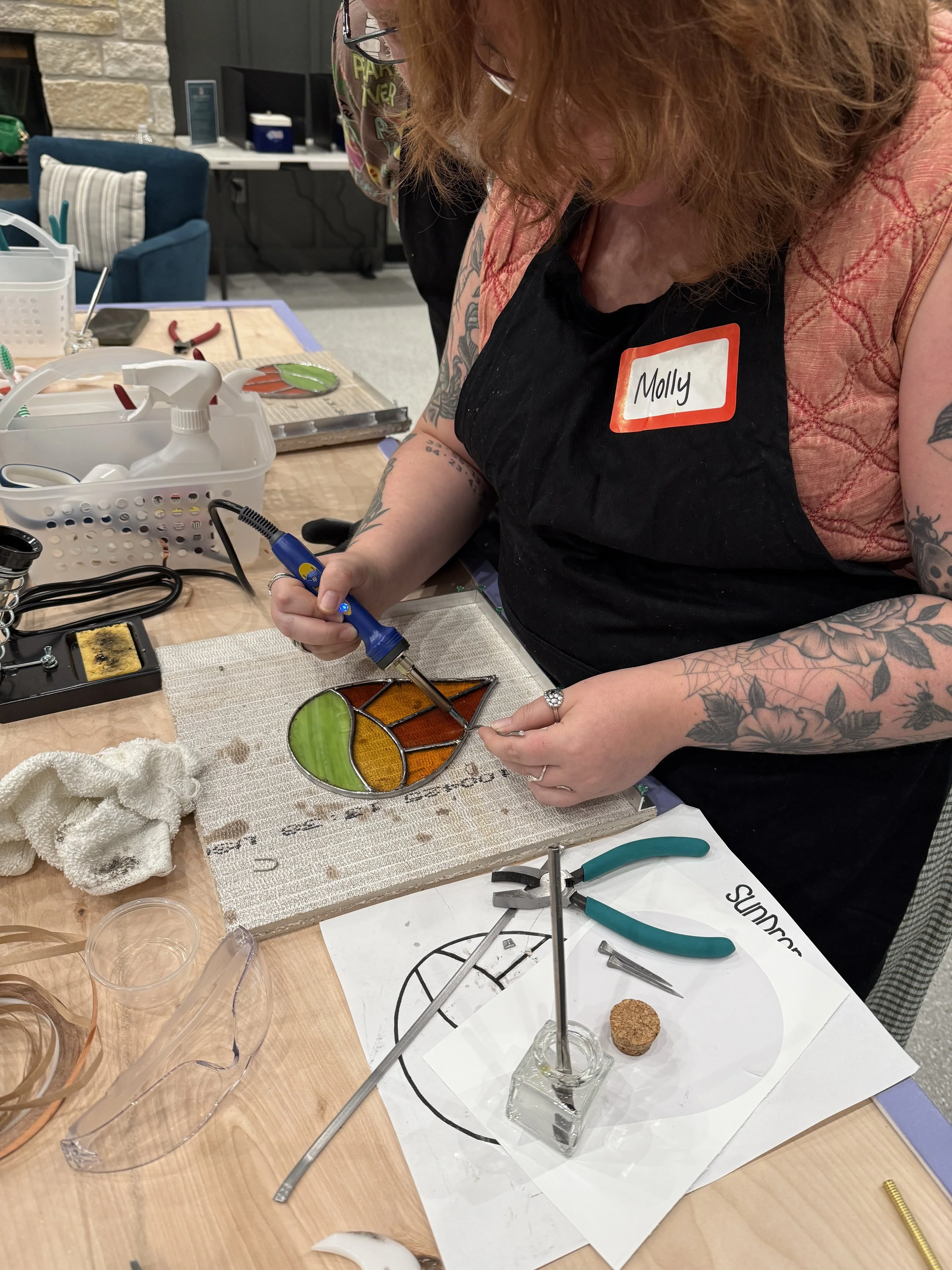 Beginner stained glass workshop making a teardrop design