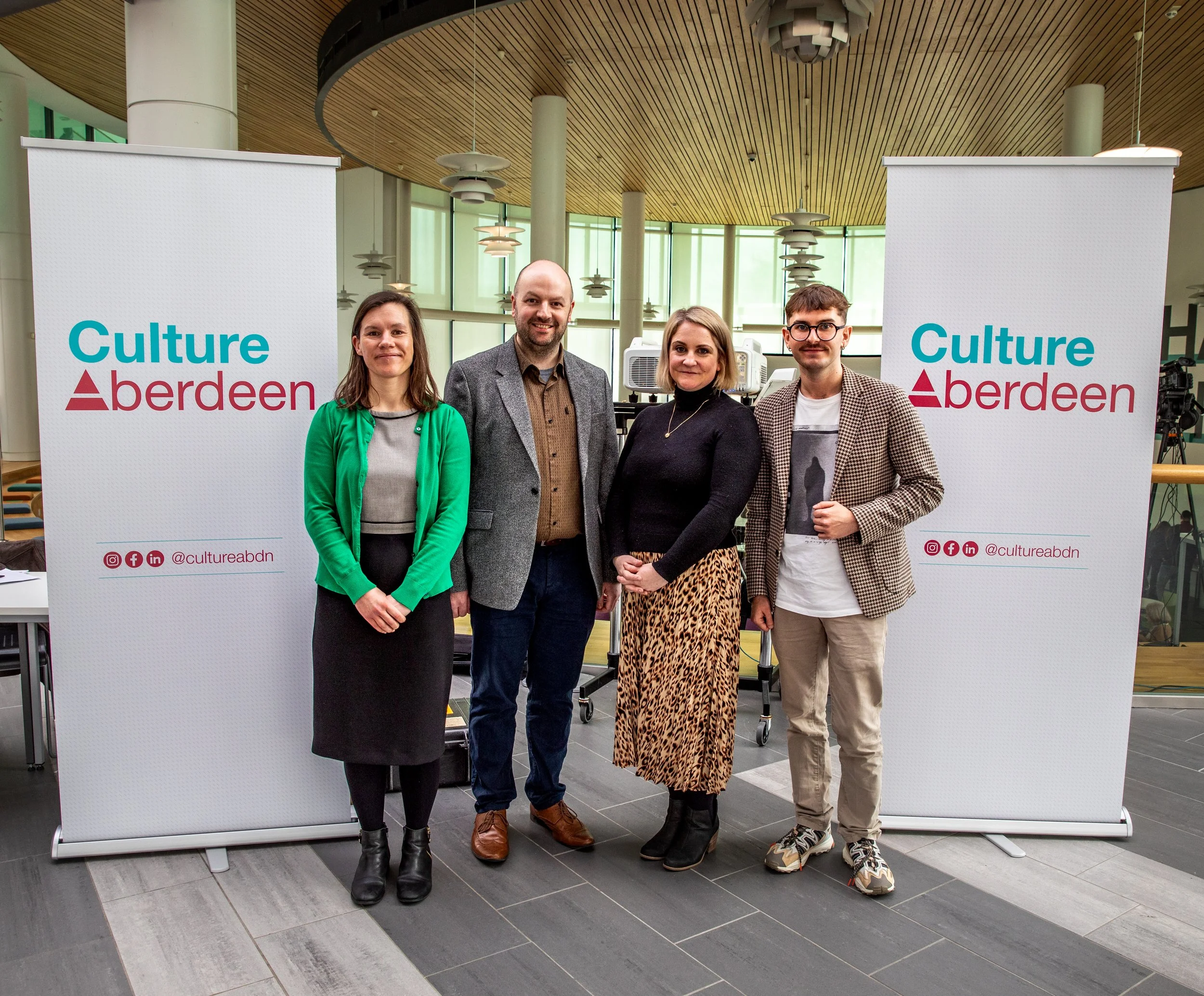 Pictured: Exchange Aberdeen organisers Hayley Durward, Ben Torrie, Lindsay Dunbar, and Bart Grabski. Photo by Martin Parker, 2025