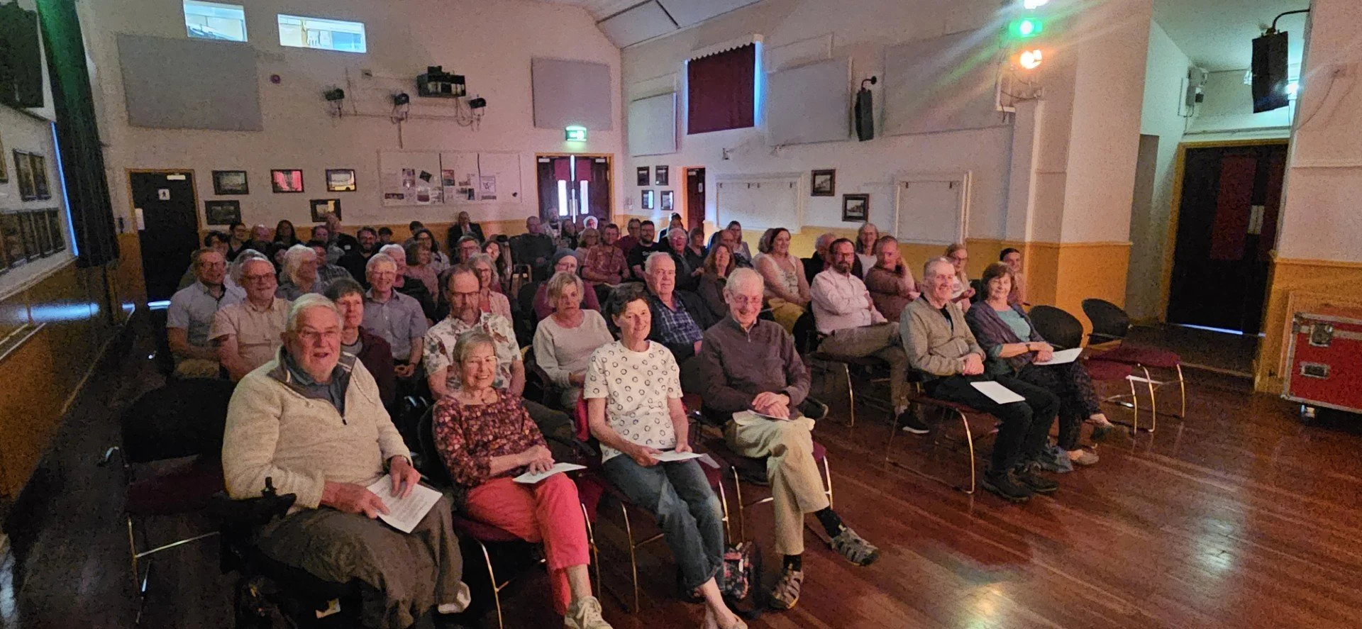 Audience at Kemnay Village Hall awaits some magic from the Great Baldini promoted by North East Arts Touring (May 2025)