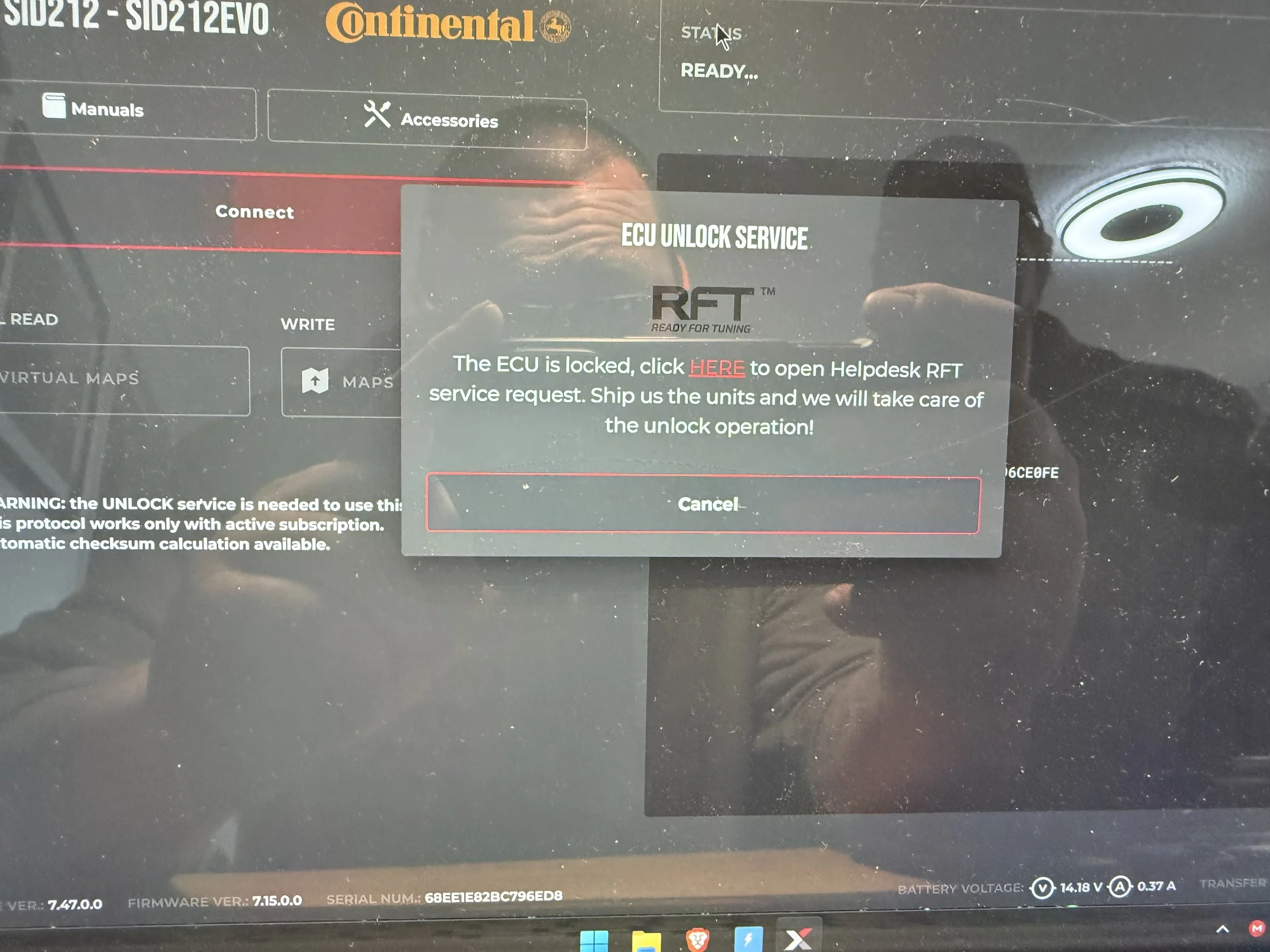 A screen from a vehicle diagnostic tool showing an ECU unlock request. A pop-up message states the ECU is locked and provides instructions to click 'HERE' to open a helpdesk request for unlocking the unit. The background displays various menu options