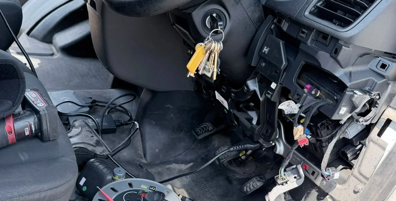 Main BCM wiring harness socket inside a vehicle dashboard