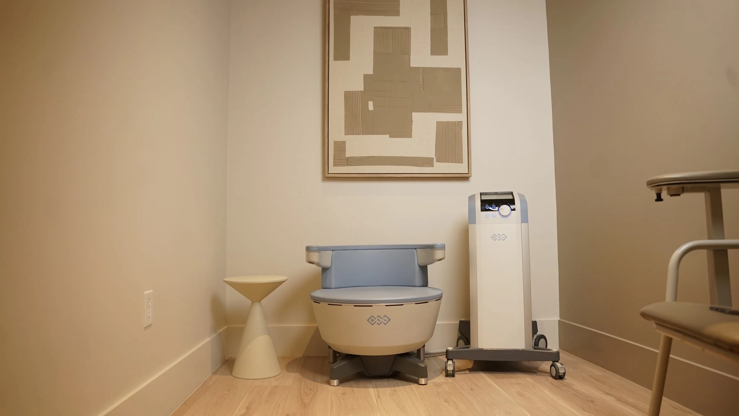 EMSella pelvic floor chair and treatment room at Revique Medical and Aesthetics in Arlington TX