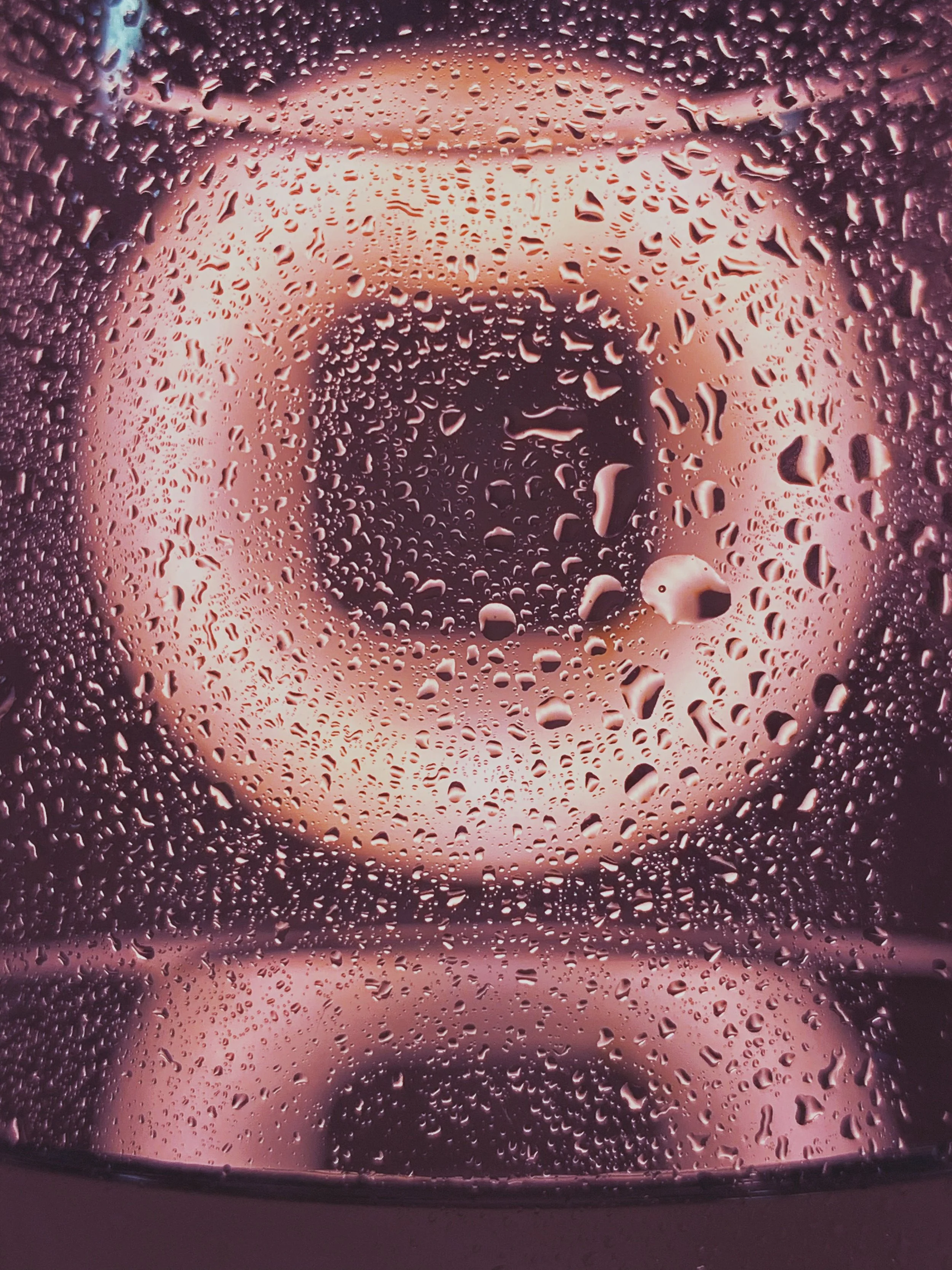 Water droplets representing natural vaginal moisture and ThermiVa intimate wellness treatment