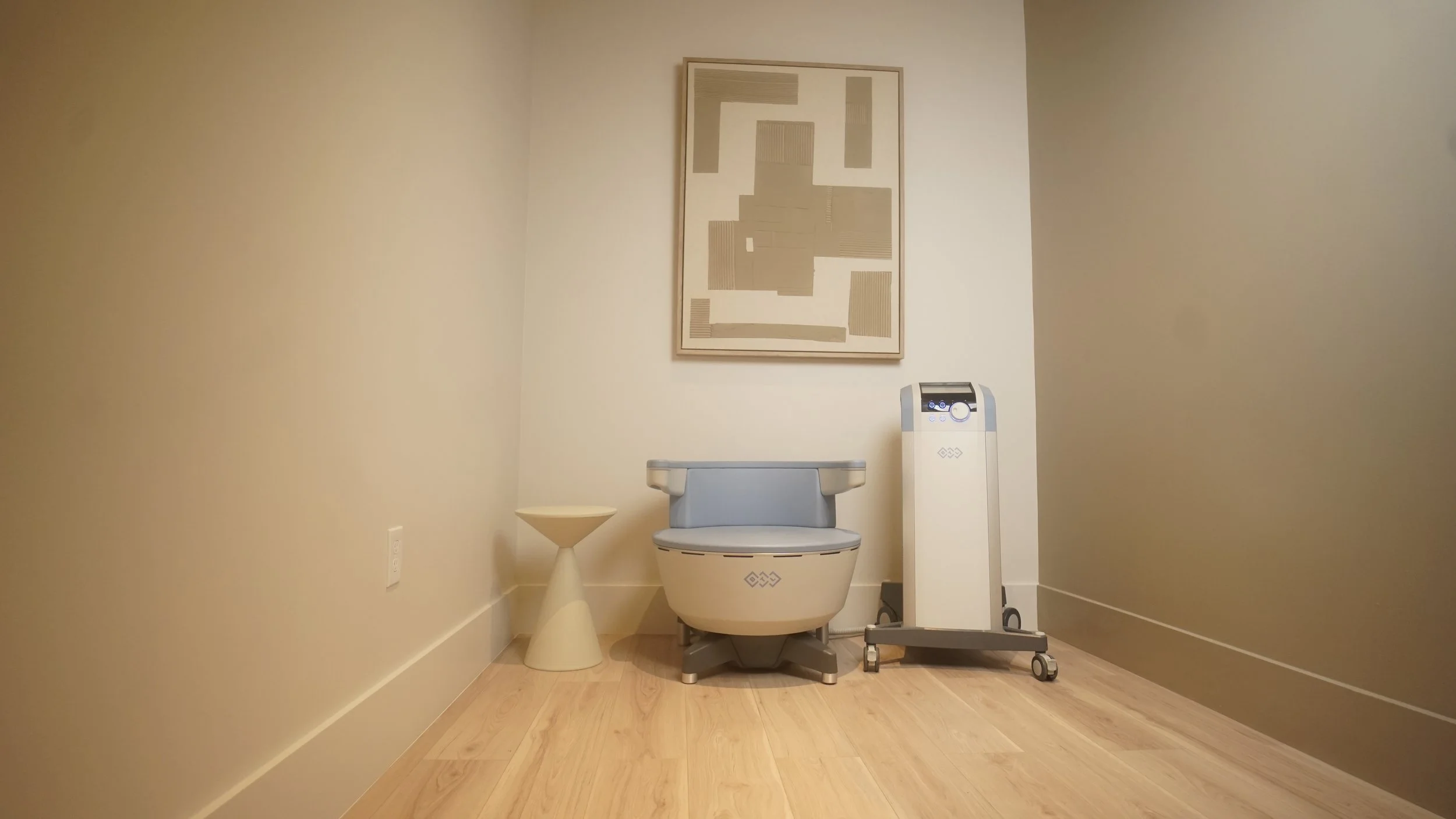 Private treatment room for Emsella pelvic floor therapy at Revique Medical & Aesthetics