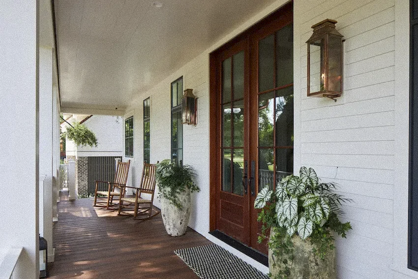 low country porch with white lap siding