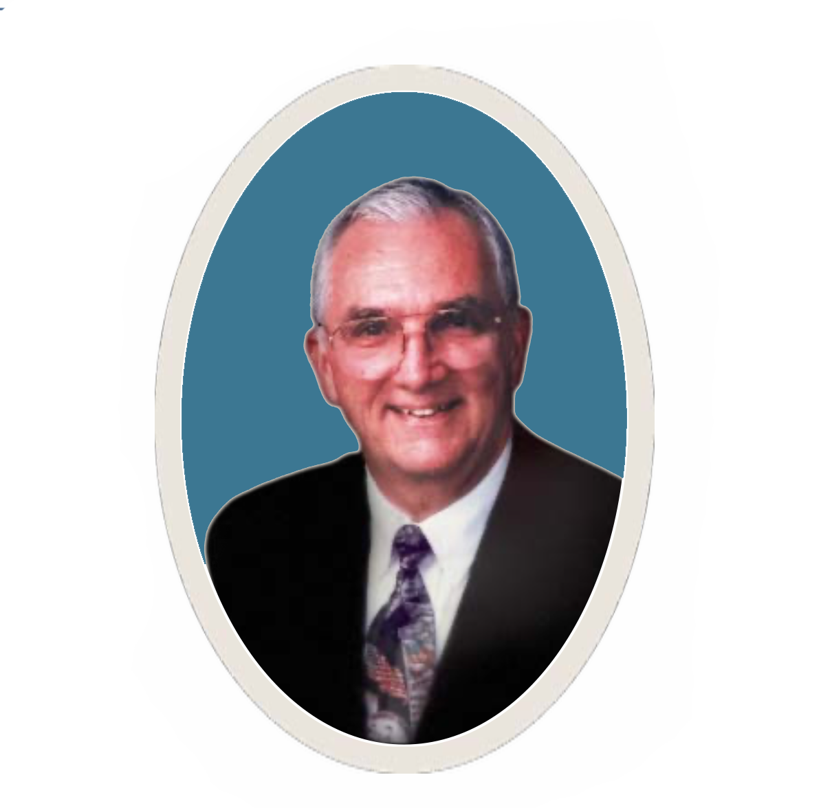 Photo of a smiling man with gray hair, glasses, wearing a suit and tie, against a blue oval background.