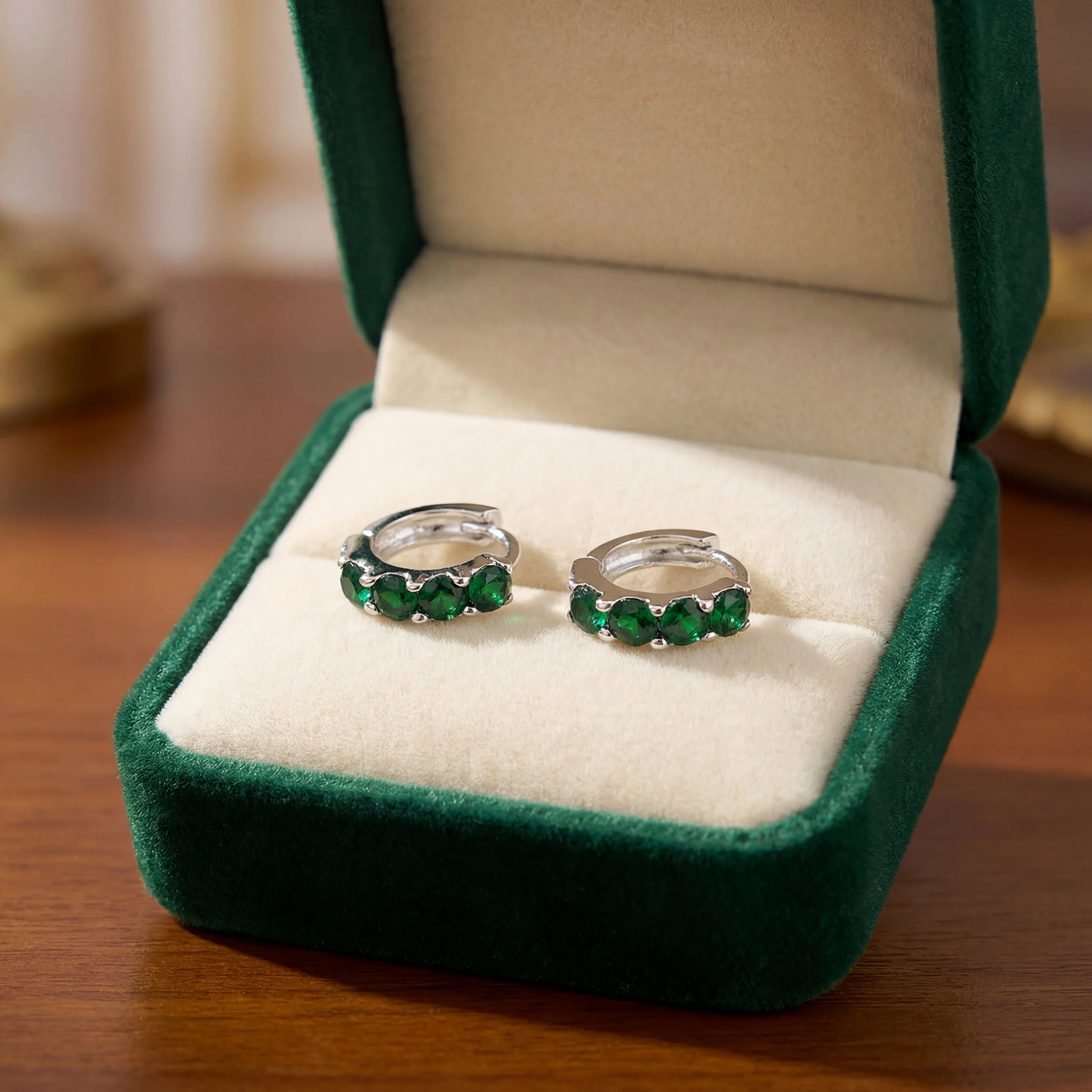 Sterling Silver Hoop Earrings with Round Emerald Colour Stones