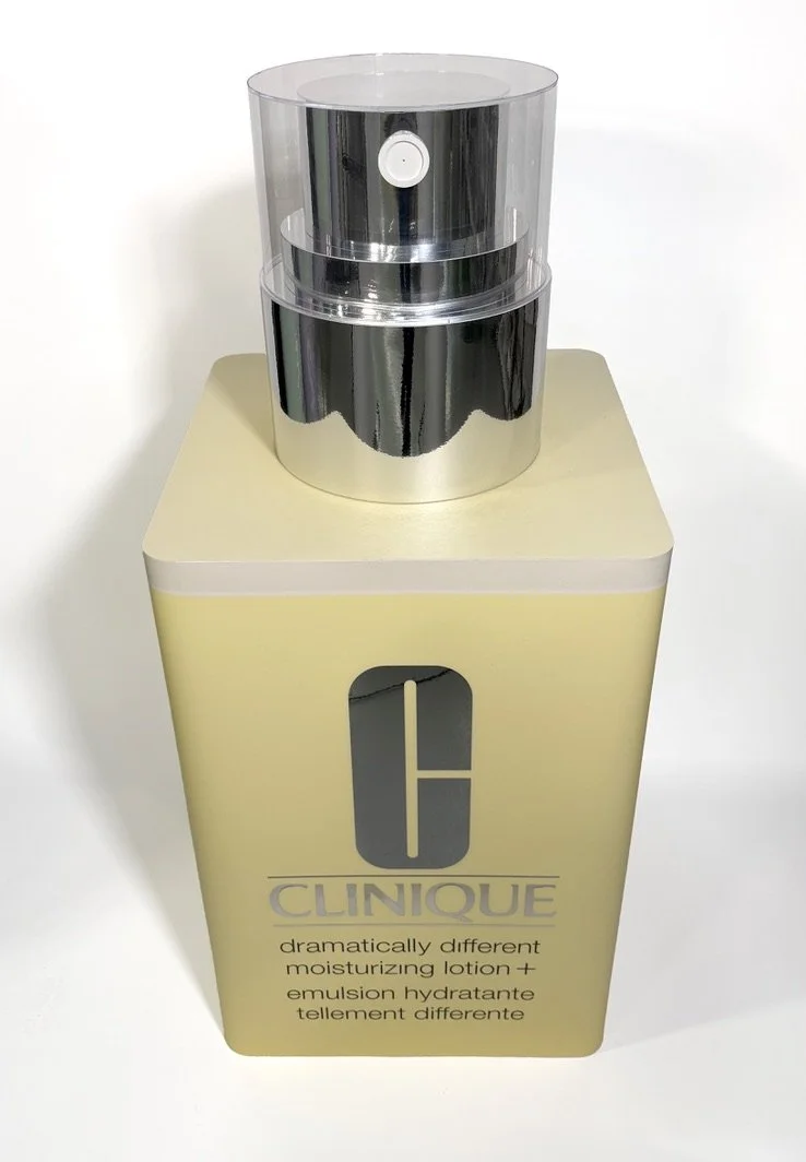 Clinique skincare product in a beige box with a clear plastic cap on top.