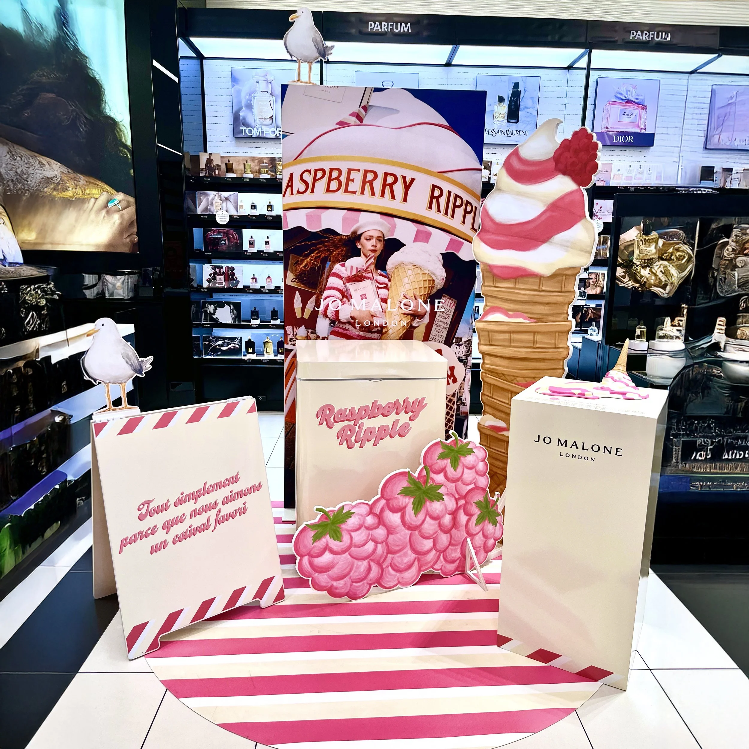 The Raspberry Ripple graphics incorporate playful patterns on various substrates, delivering a vibrant and thematic visual enhancement to the retail display area.
Project: Raspberry Ripple | Client: Estee Lauder | Design credit: Estee Lauder
