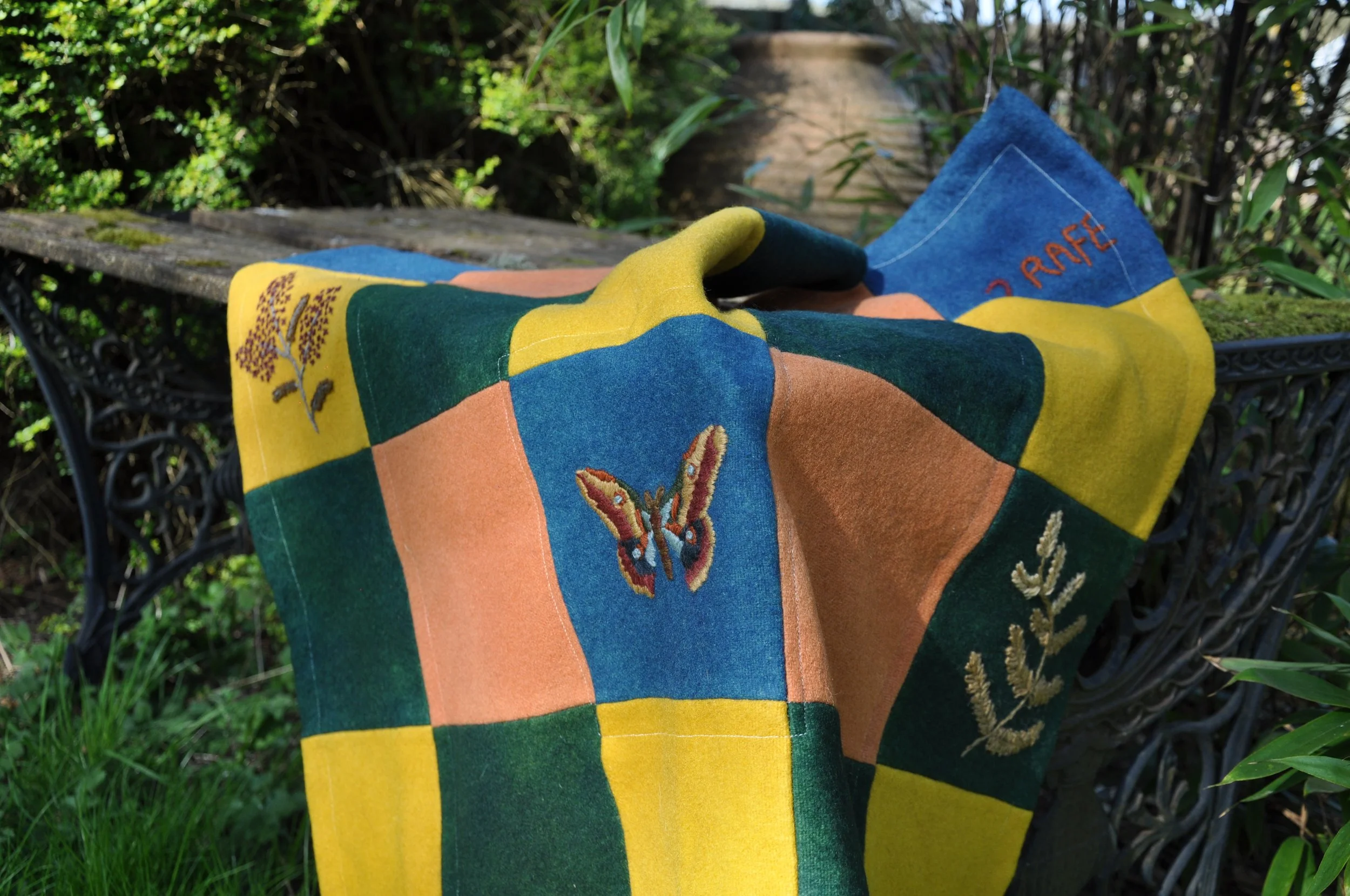 Naturally dyed, embroidered quilt