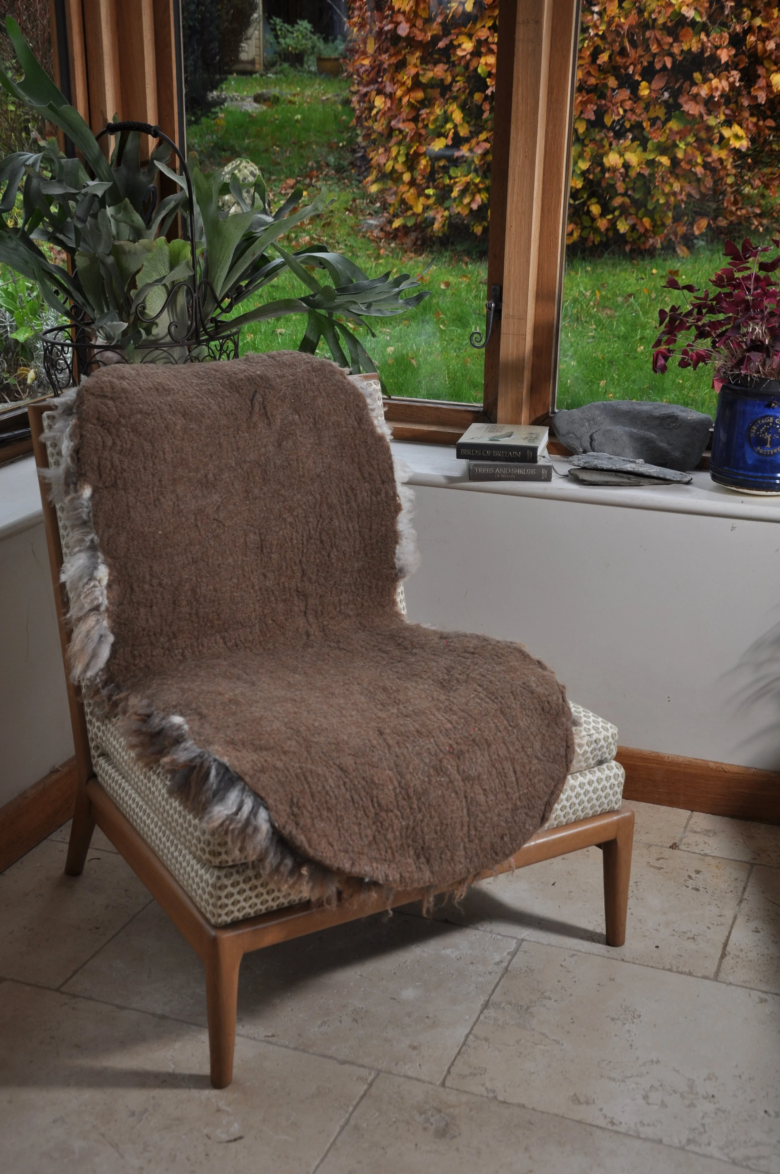 back of felted rug on chair