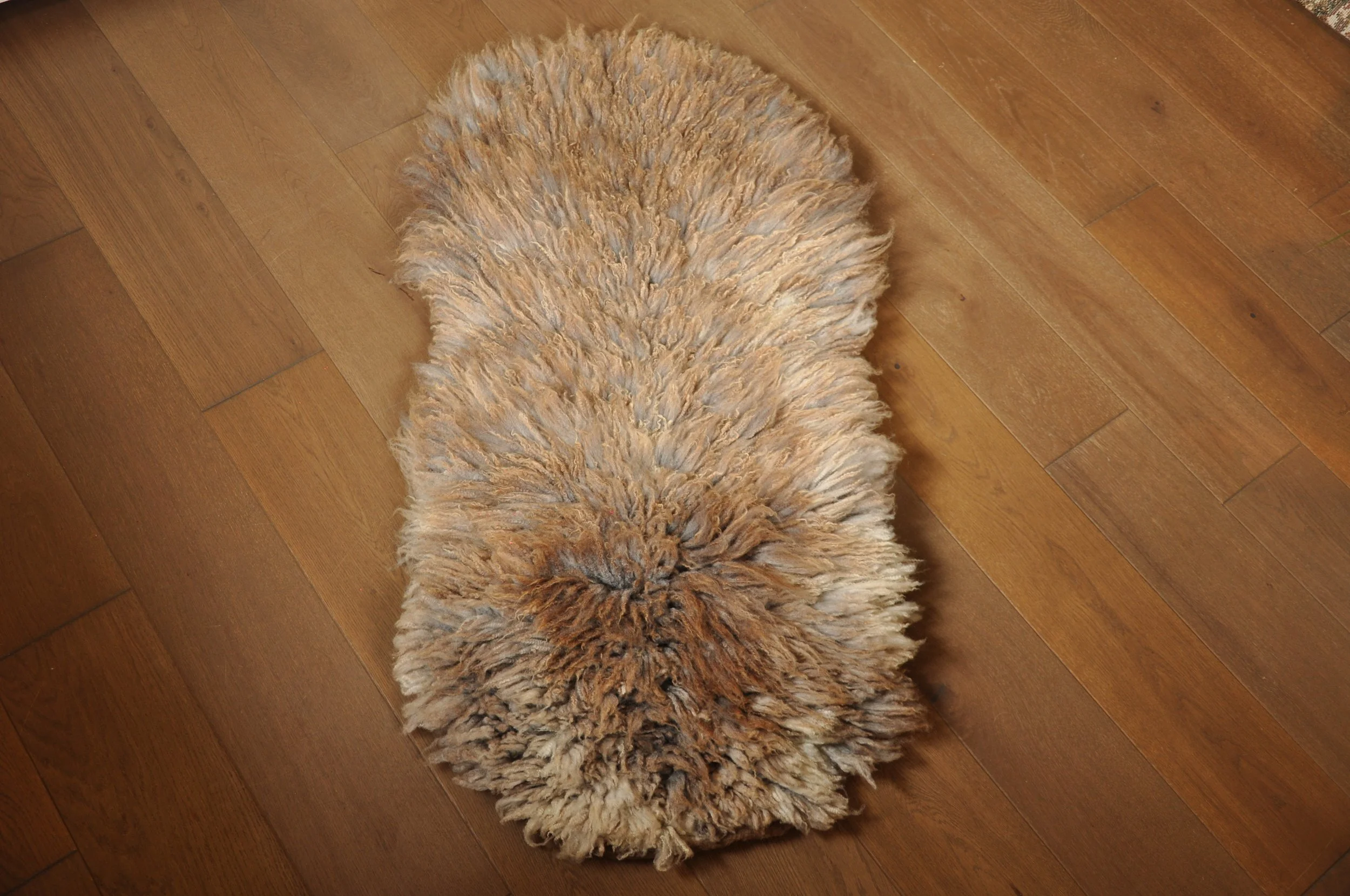 Felted rug on floor