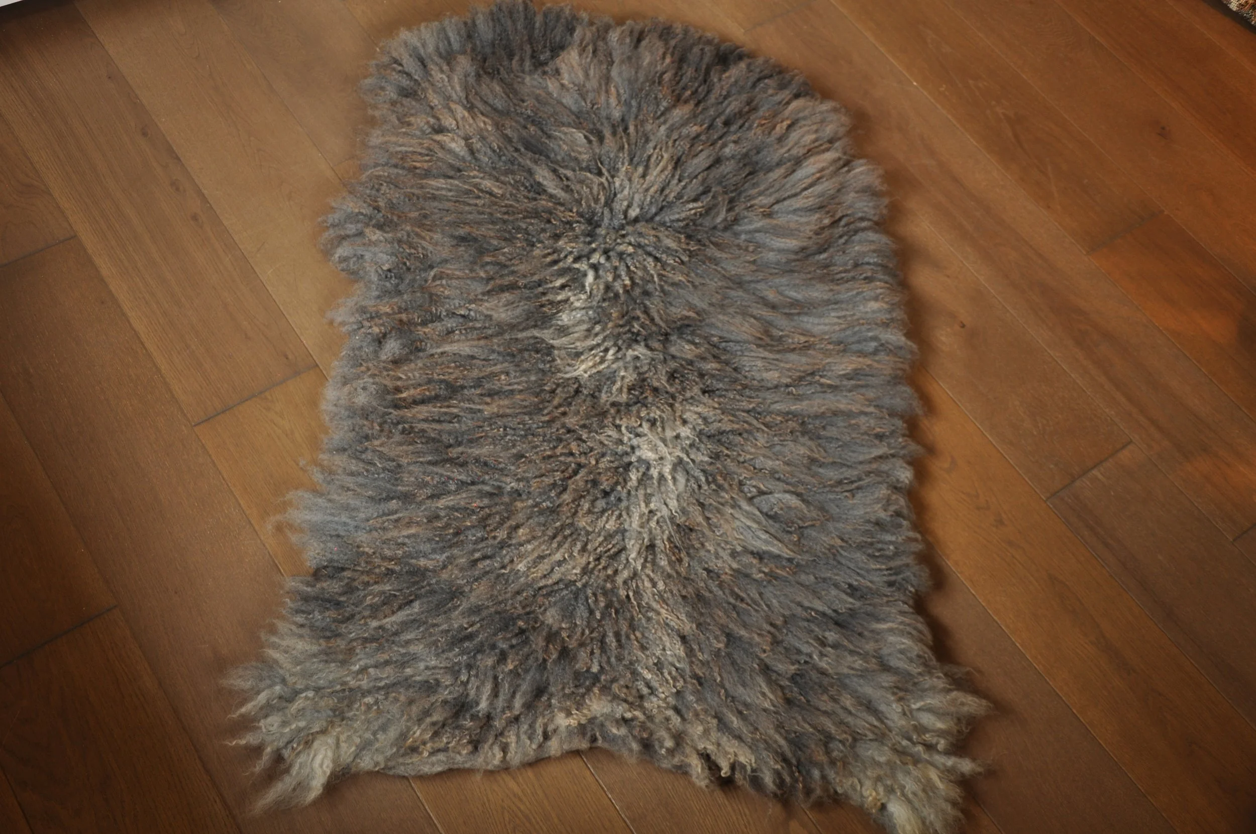 Felted rug on floor