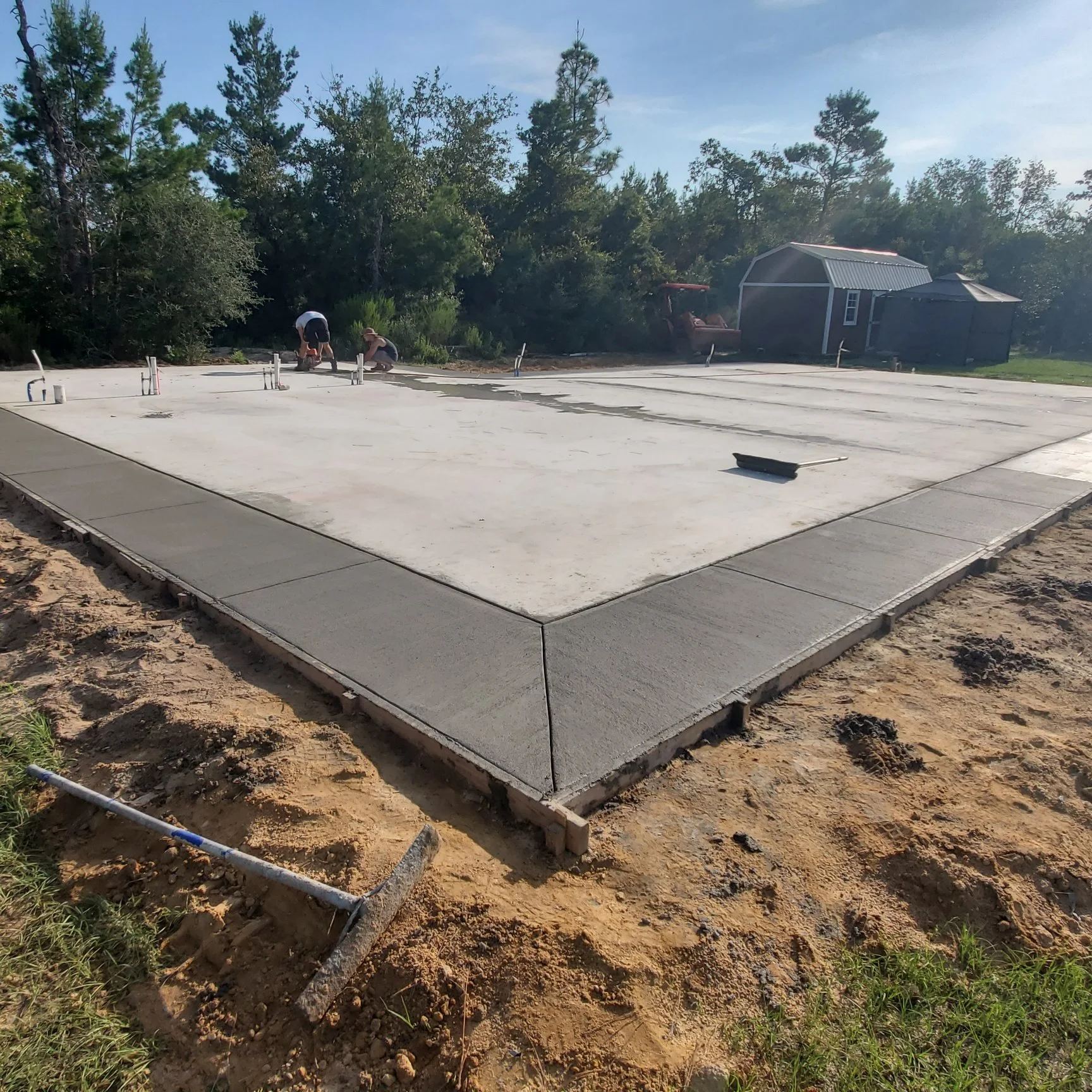 Concrete foundation poured and prepared for new construction by Tindall Construction.