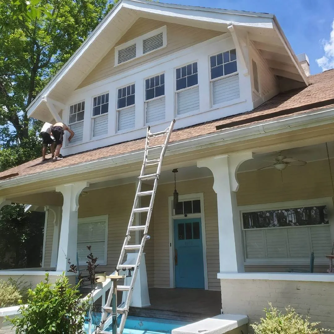 Completed outdoor pavilion with shingle roof constructed by Tindall Construction.