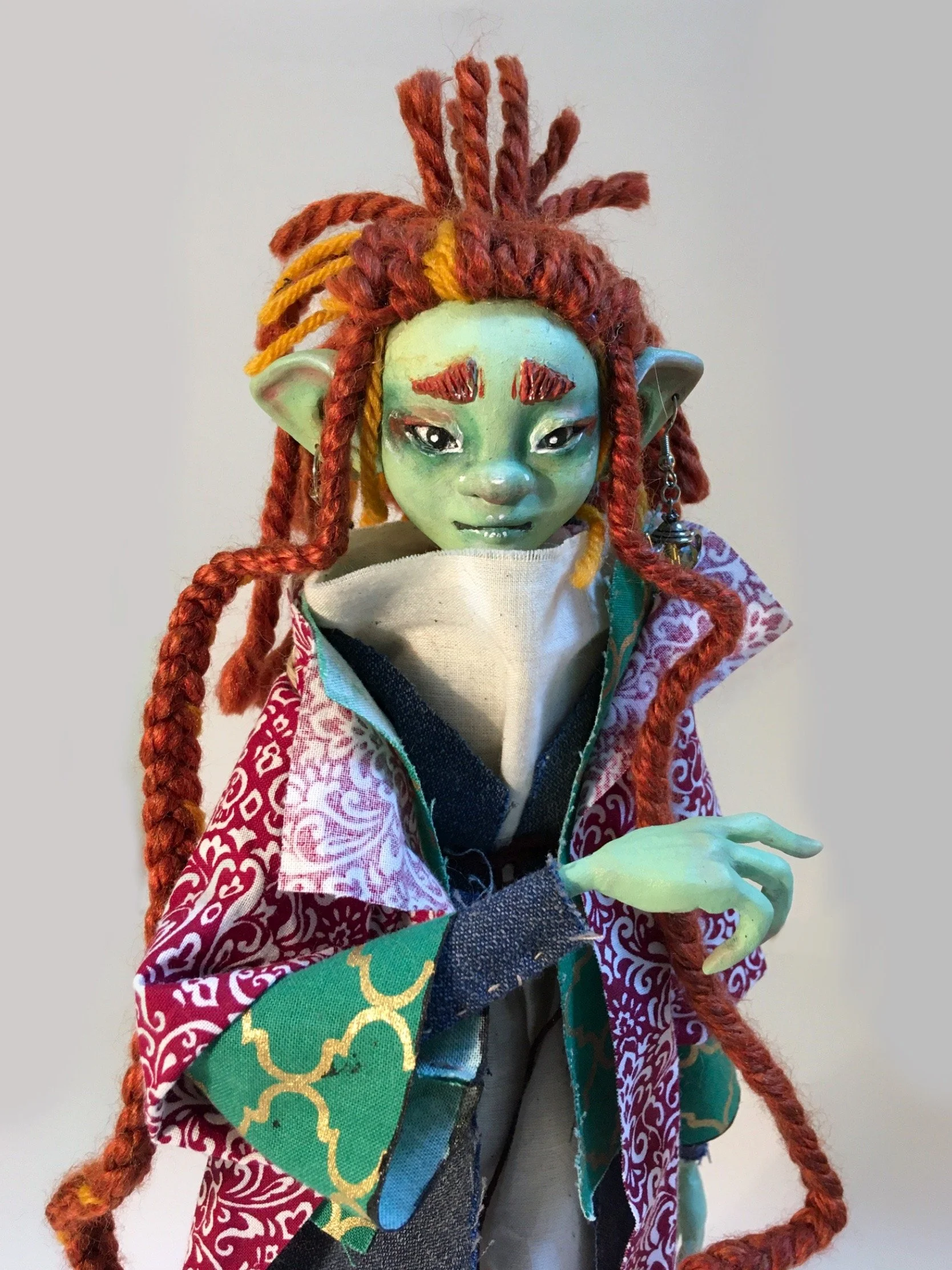 Fabric-Store Goblin -
fabric scraps, yarn, polymer clay, and acrylic paint