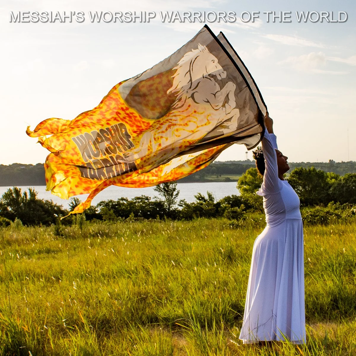 Hand Painted Silk Worship Flags with the image of a white horse bringing in the fire of God and the words Worship Warrior behind it.
