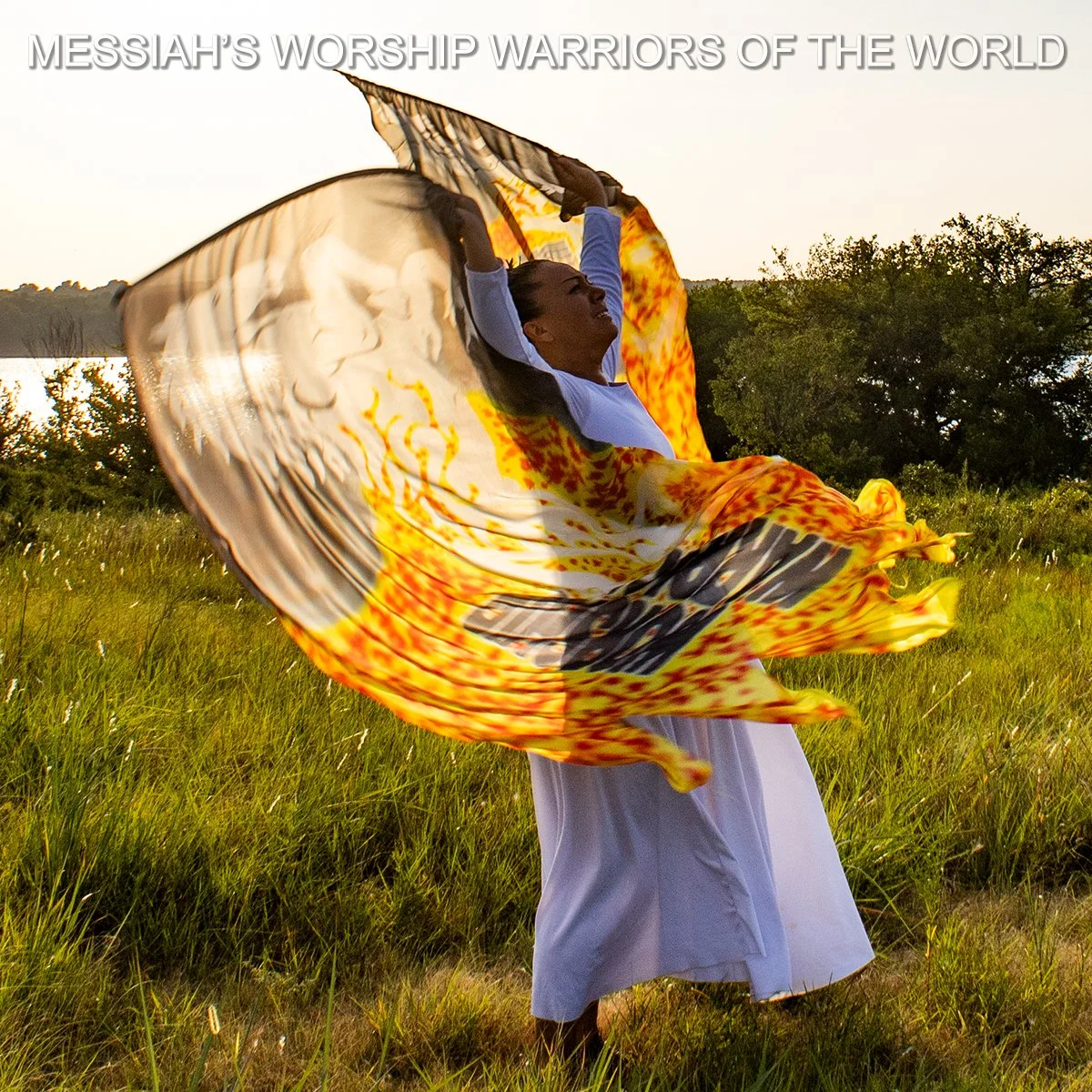 Hand Painted Silk Worship Flags with the image of a white horse bringing in the fire of God and the words Worship Warrior behind it.