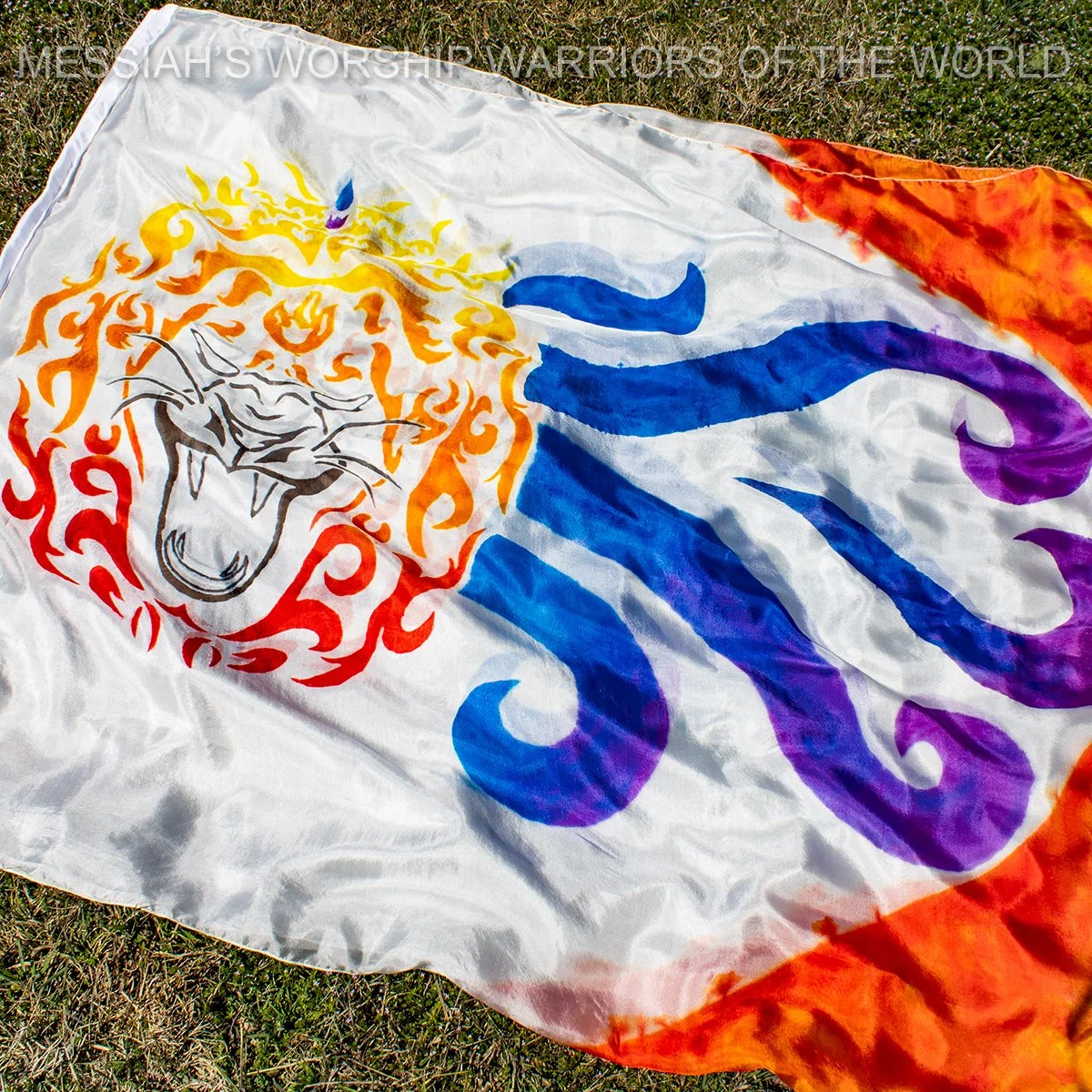 Hand Painted Silk Worship Flags with the image of a fierce lion roaring and blowing wind while pushing the fire of adversity away.