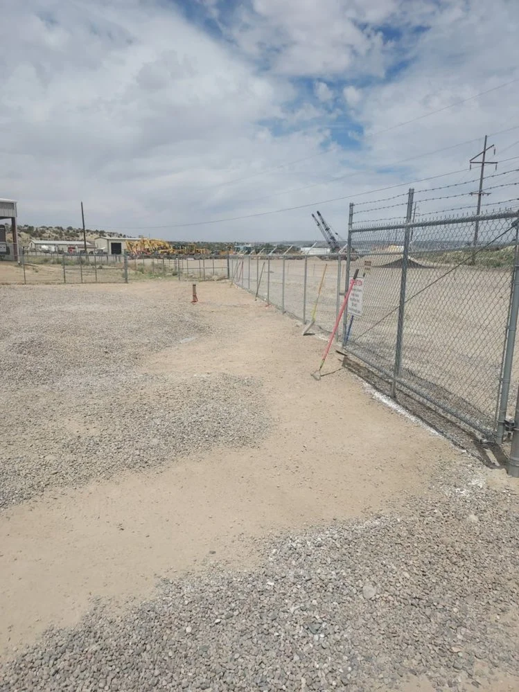 Weed barrier and gravel installation completed along Vista Del Rio Court by Priddy Landscaping and Irrigation in Farmington NM