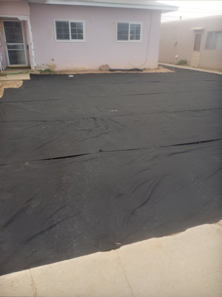 Gravel driveway replacement finished near Naples Drive by Priddy Landscaping and Irrigation in Farmington NM