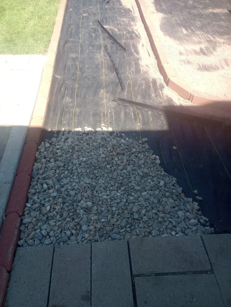 Residential gravel installation in Farmington NM by Priddy Lawn Care
