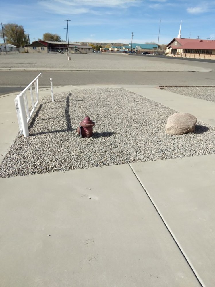 Decorative gravel landscaping completed by Priddy Landscaping and Irrigation on Las Brisas Trail in Farmington NM