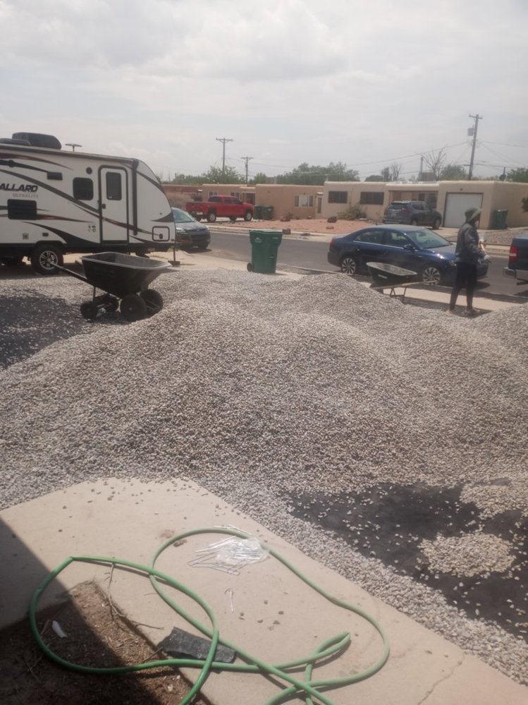 Gravel landscaping completed on Cimarron Avenue in Aztec NM by Priddy Landscaping and Irrigation