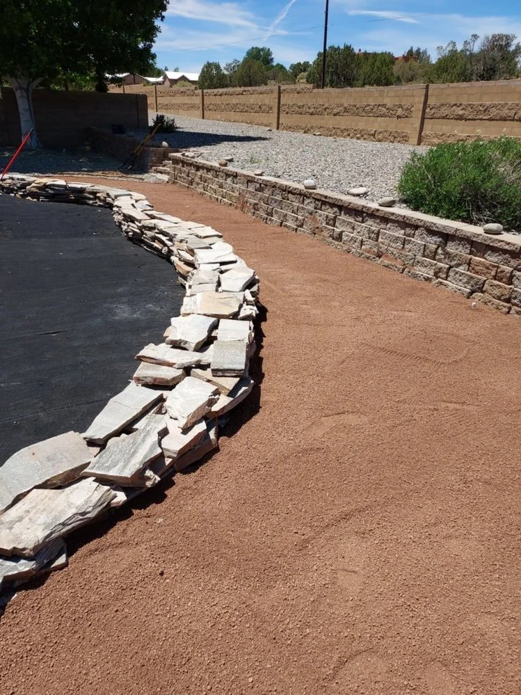 Low-maintenance gravel landscaping on Pecan Street in Bloomfield NM by Priddy Landscaping and Irrigation