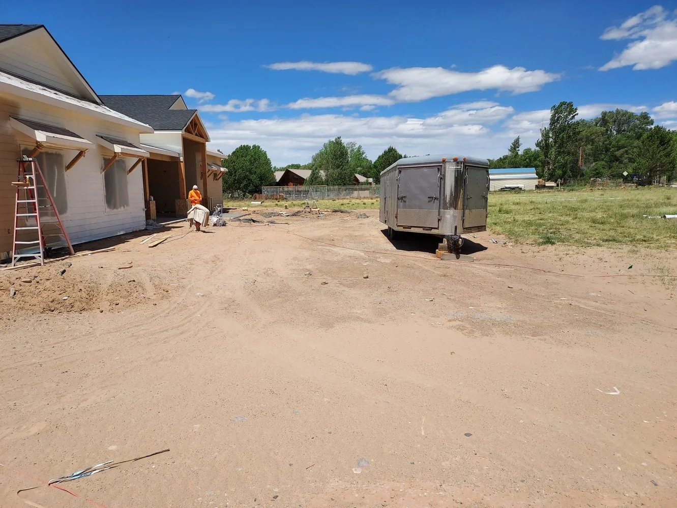 Weed barrier and gravel installation completed on Sandstone Drive in Farmington NM by Priddy Landscaping and Irrigation