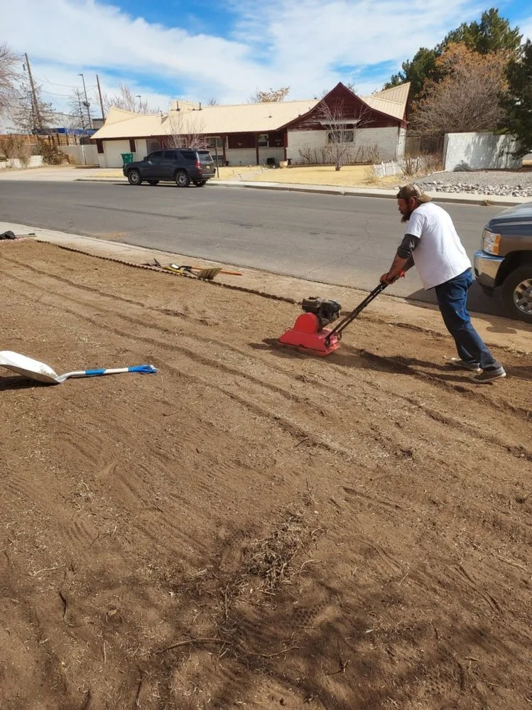 Priddy Landscaping and Irrigation completing a gravel yard upgrade near Fairway Drive in Farmington NM