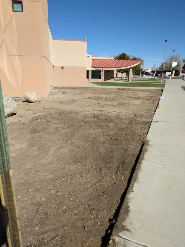 Decorative gravel landscaping completed by Priddy Landscaping and Irrigation on Las Brisas Trail in Farmington NM