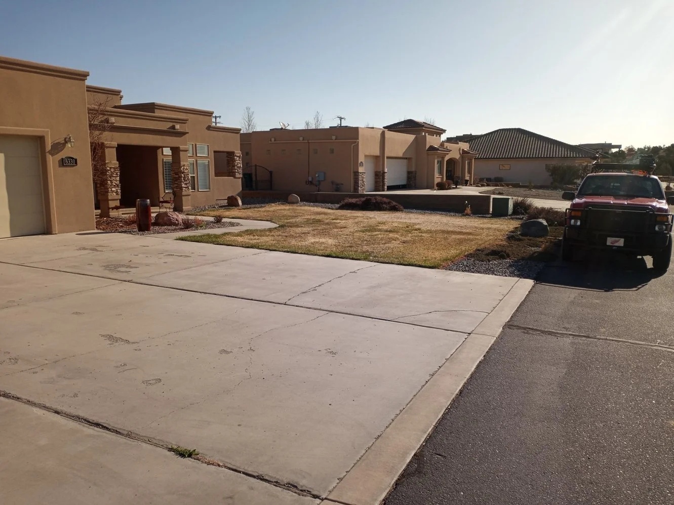 Gravel driveway installed by Priddy Landscaping and Irrigation on Naples Drive in Farmington NM