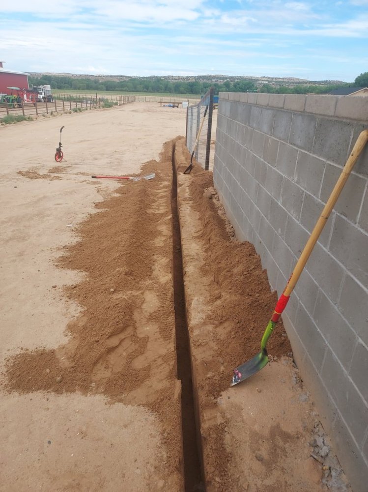 Decorative gravel installation on Ash Avenue in Bloomfield NM by Priddy Landscaping and Irrigation