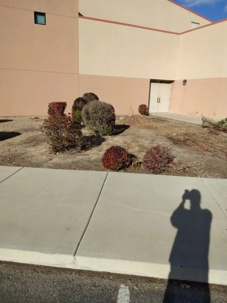 Gravel landscaping completed on Cimarron Avenue in Aztec NM by Priddy Landscaping and Irrigation