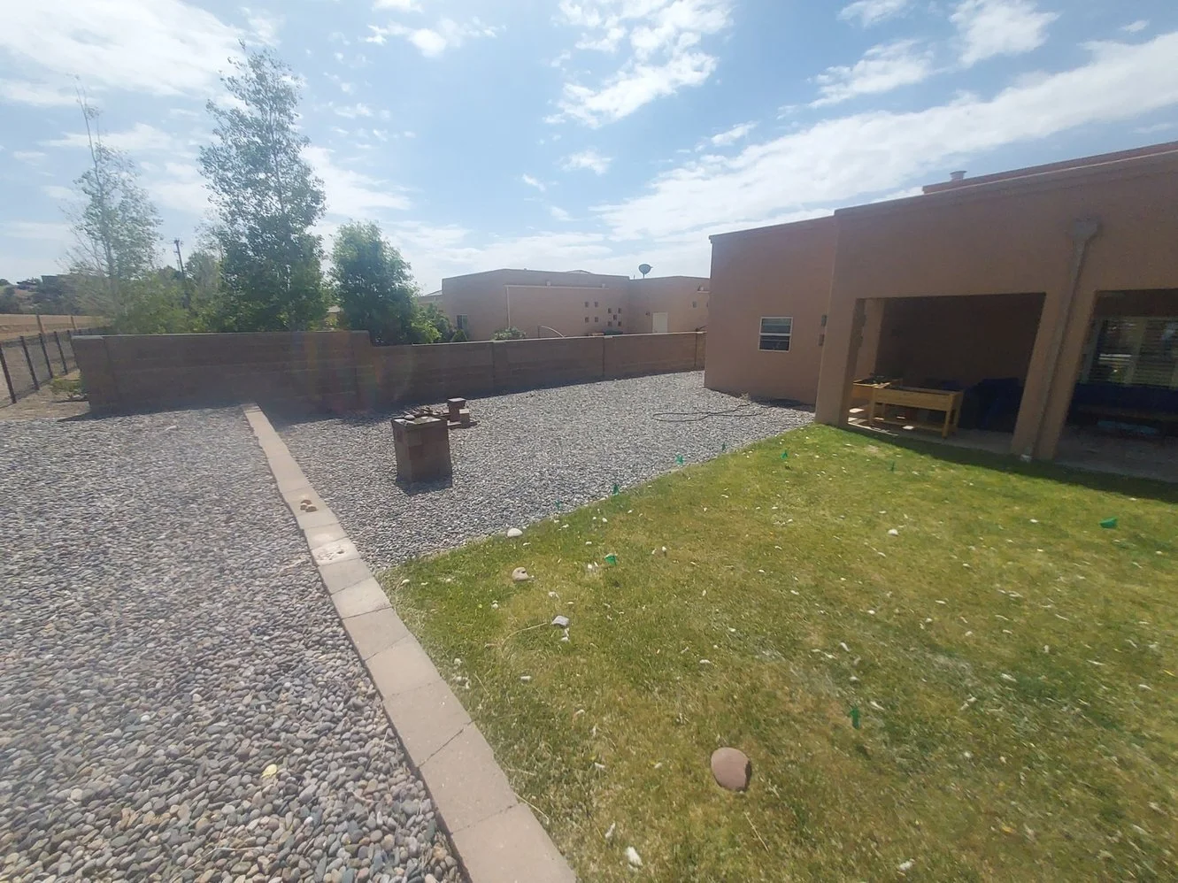 Residential gravel installation on Auburn Drive in Farmington NM by Priddy Landscaping and Irrigation