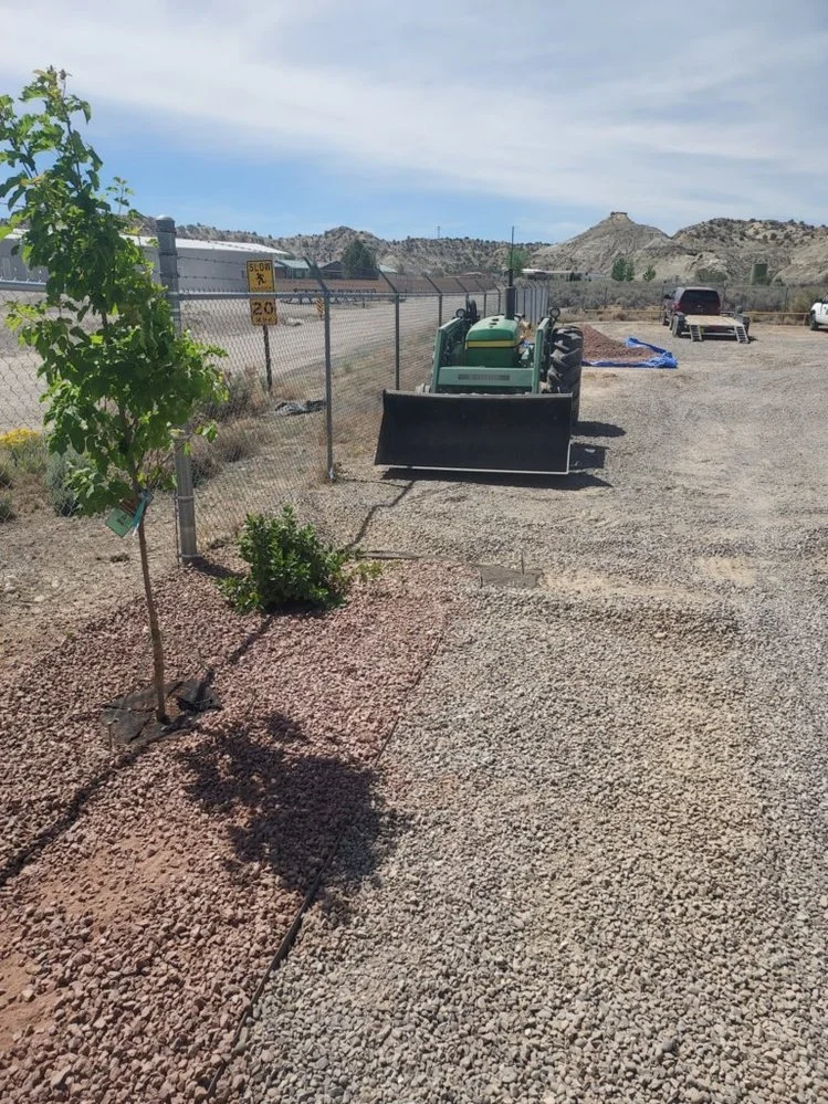 Gravel yard cleanup and edging completed near Hallmarc Drive in Farmington NM