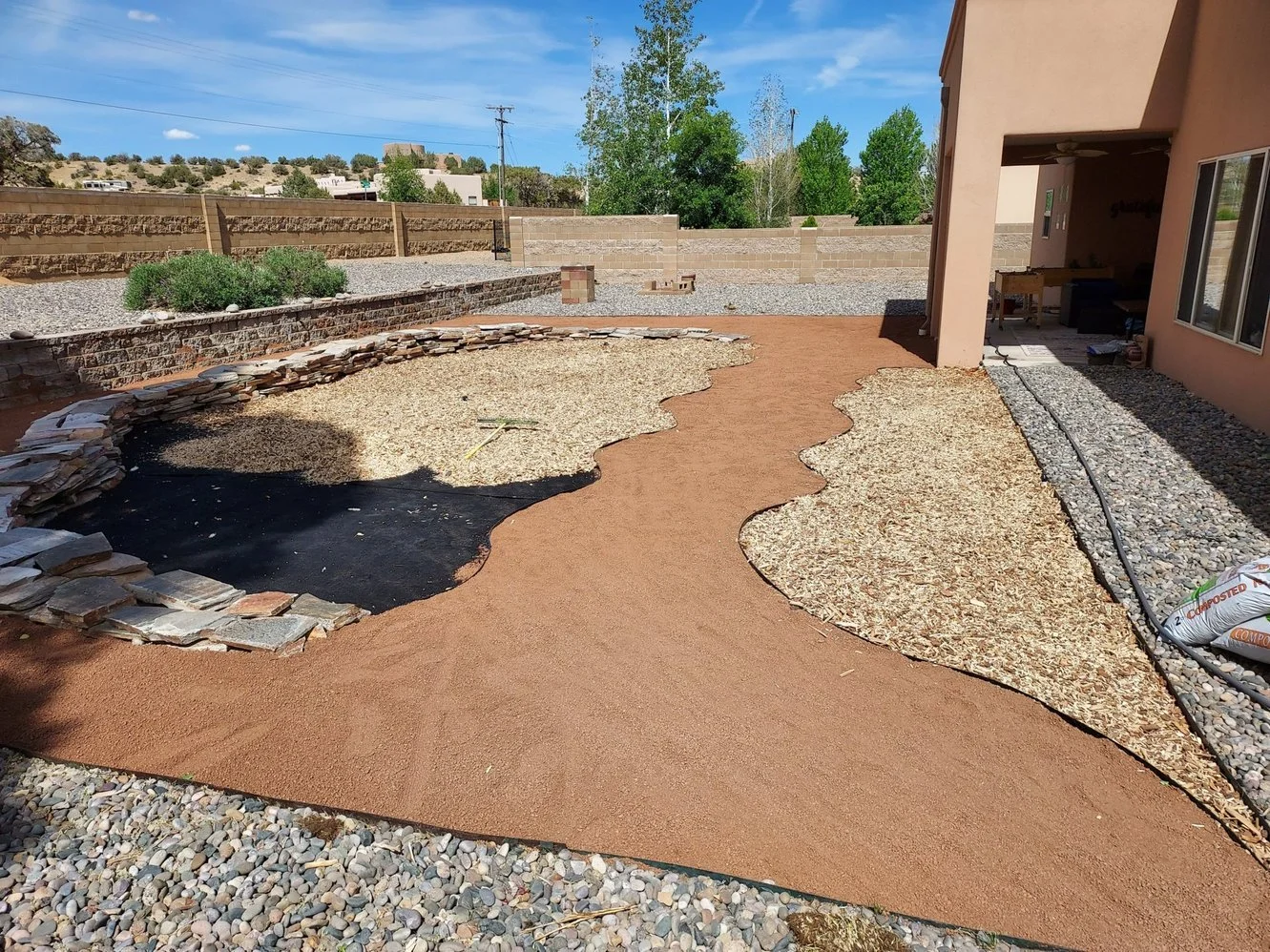 Gravel landscaping completed on Hammond Road in Bloomfield NM by Priddy Landscaping and Irrigation
