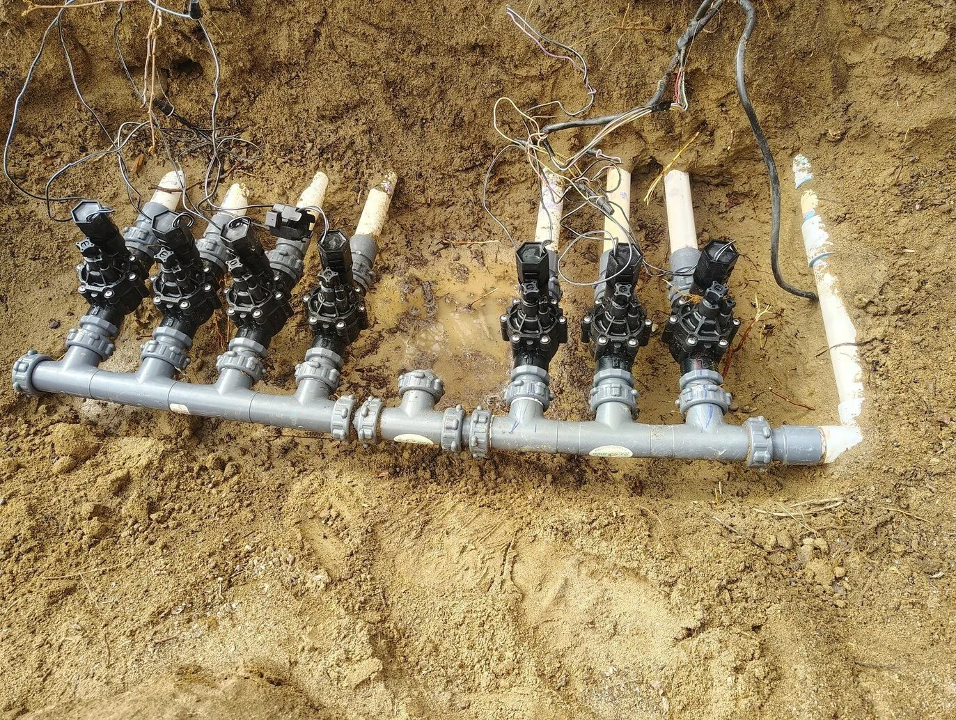 Who fixes sprinklers in Aztec NM