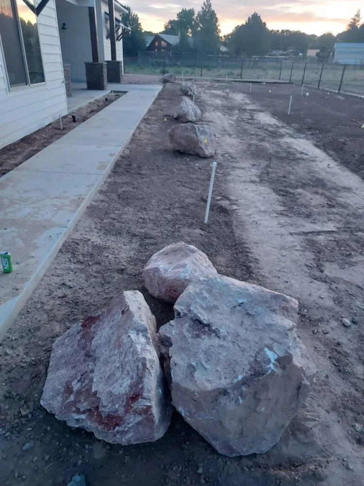 Decorative gravel installation on Ash Avenue in Bloomfield NM by Priddy Landscaping and Irrigation