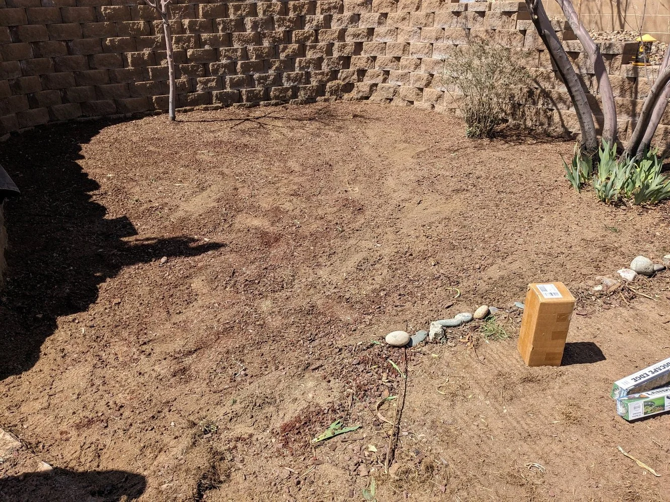 Weed barrier and gravel installation completed along Vista Del Rio Court by Priddy Landscaping and Irrigation in Farmington NM