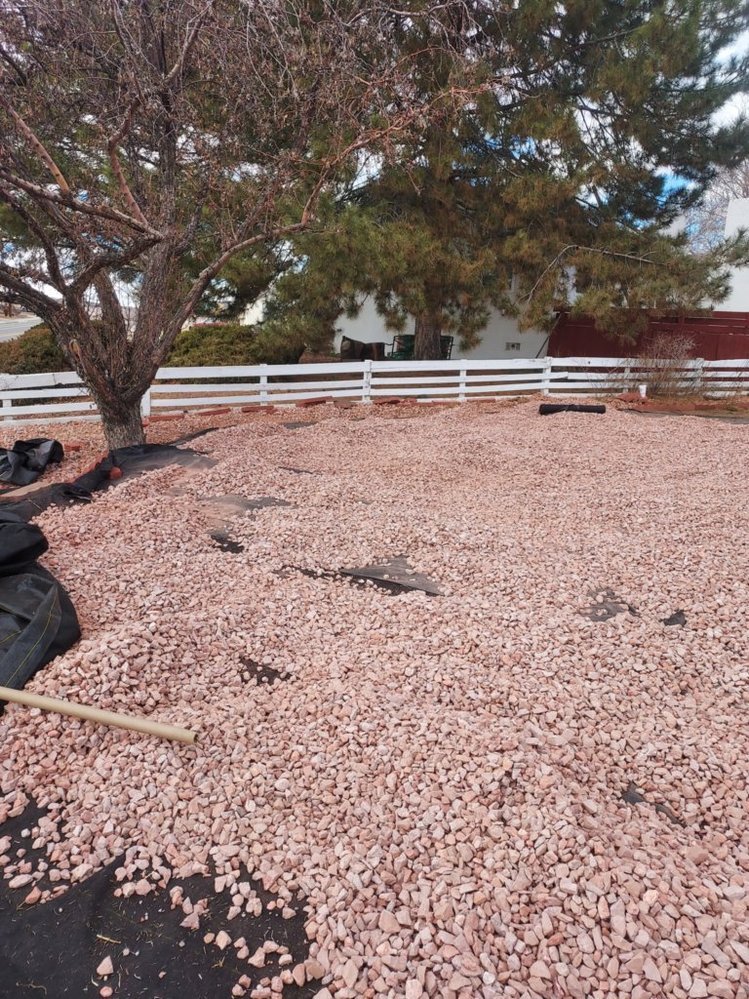 Decorative gravel landscaping on Chaco Street in Aztec NM by Priddy Landscaping and Irrigation
