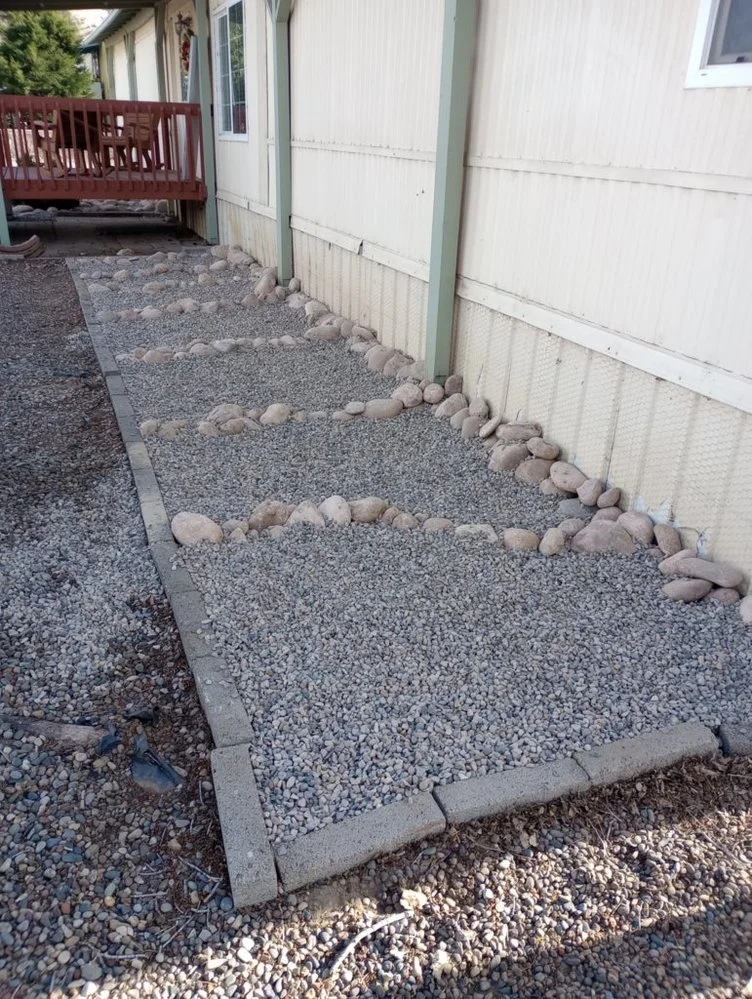 Gravel landscaping completed on Hammond Road in Bloomfield NM by Priddy Landscaping and Irrigation