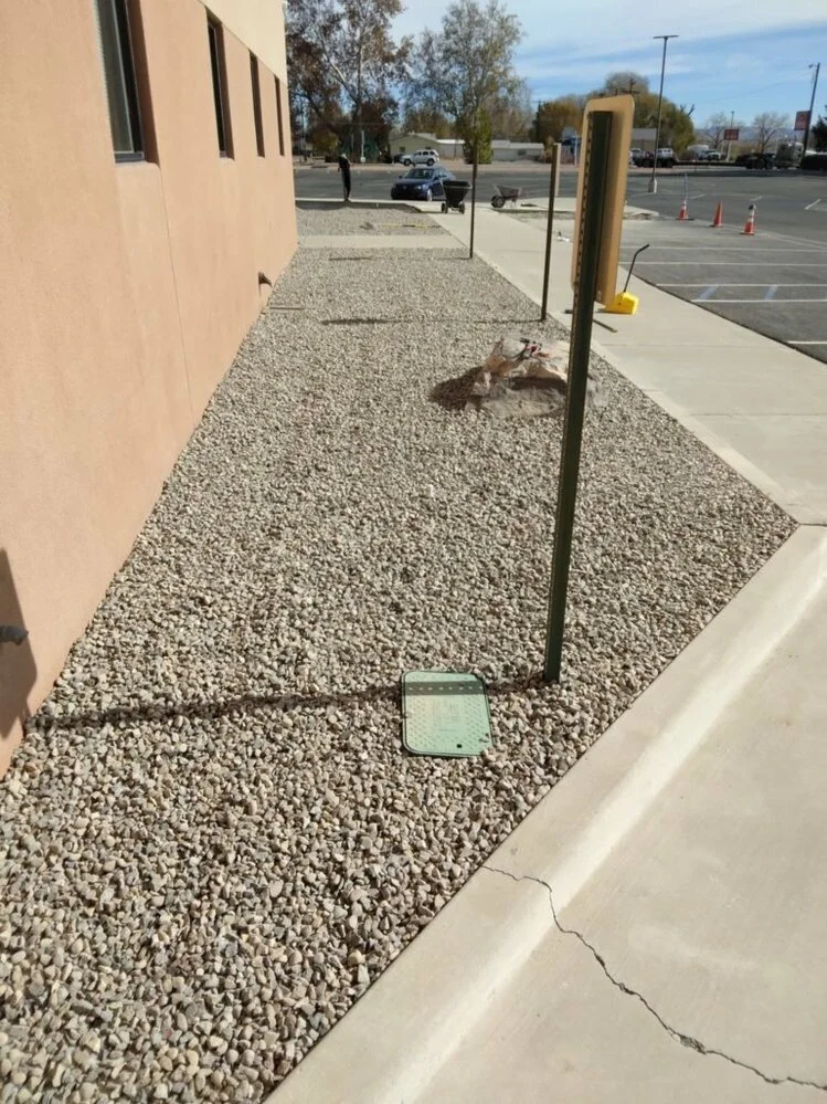Installing weed barrier and gravel Bloomfield NM